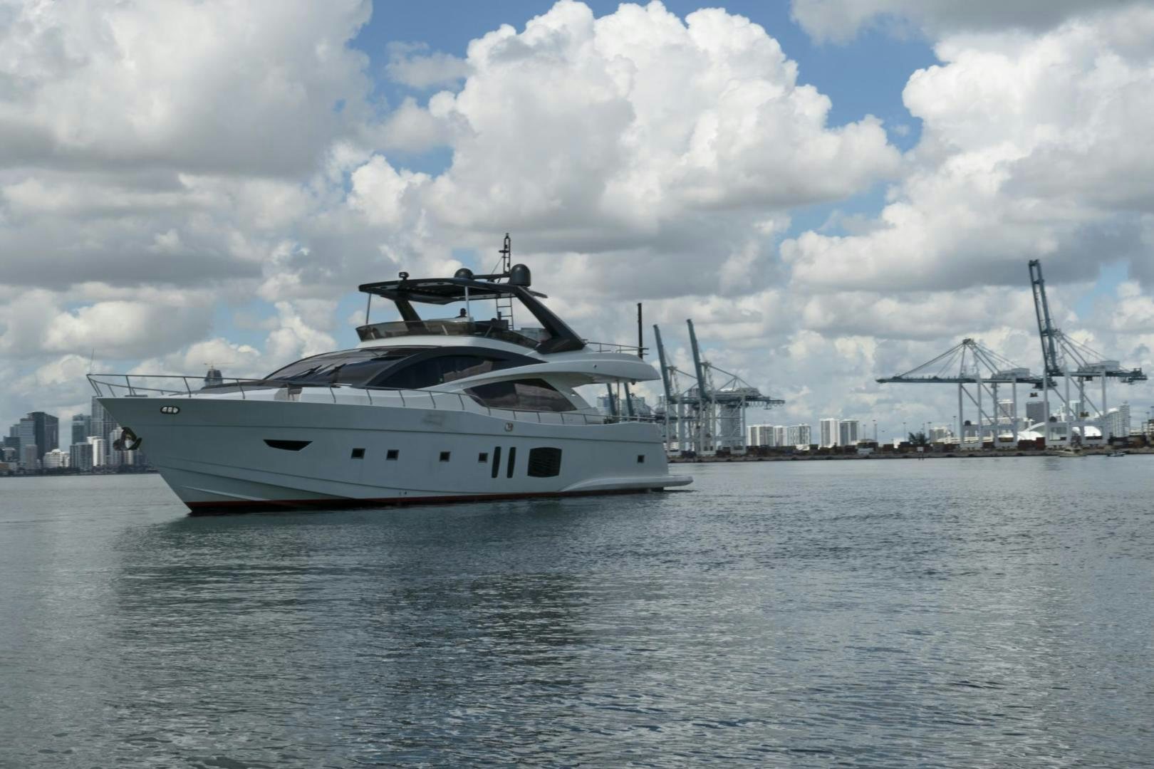 a white yacht in the water aboard EL PATRON Yacht for Sale