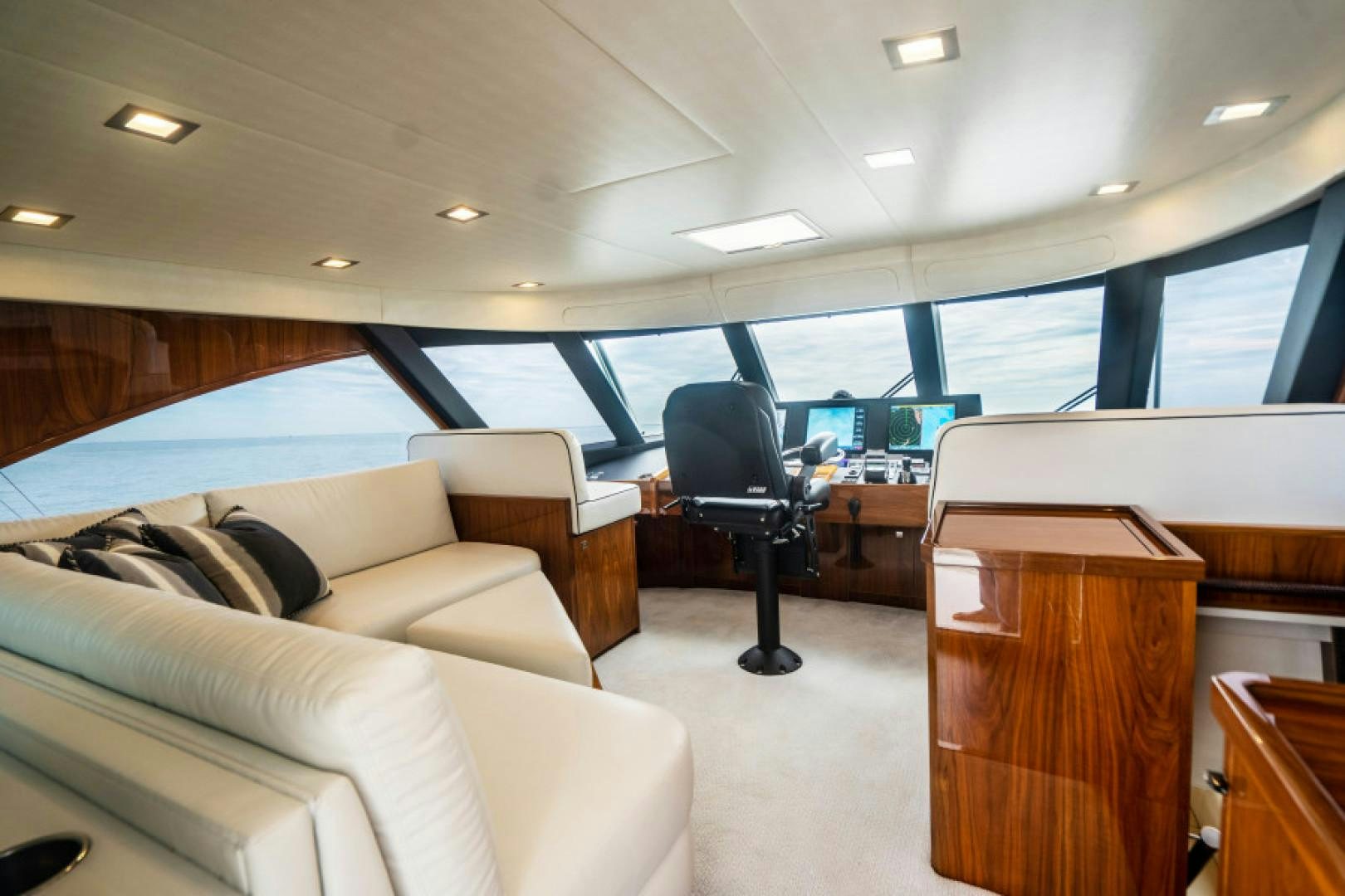 a room with a couch and a chair aboard TIKI BAR Yacht for Sale