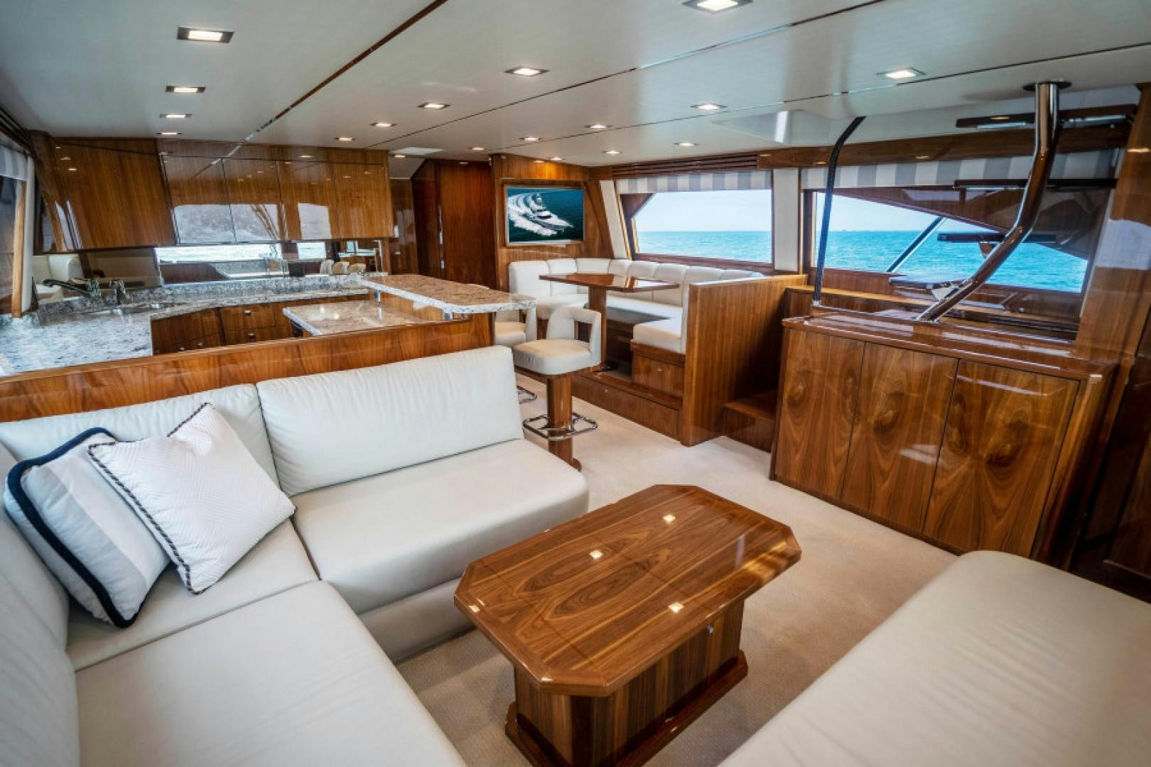 a room with a couch and a table aboard TIKI BAR Yacht for Sale