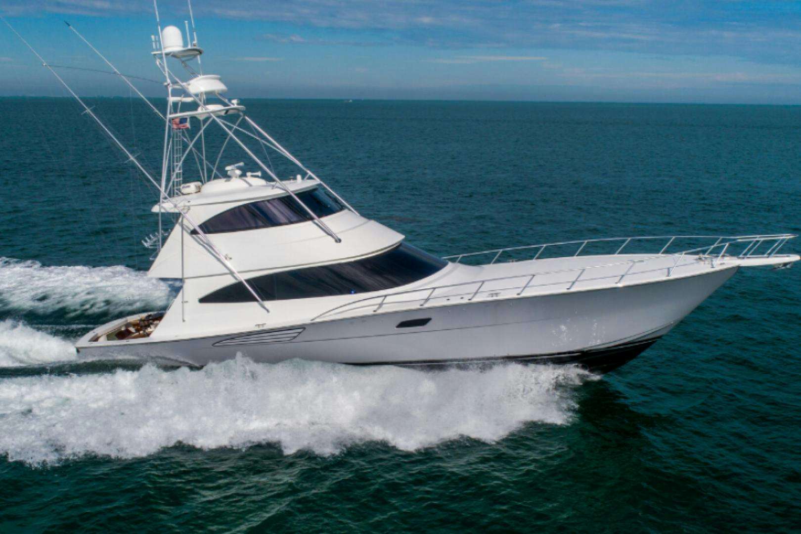 a white boat in the water aboard TIKI BAR Yacht for Sale