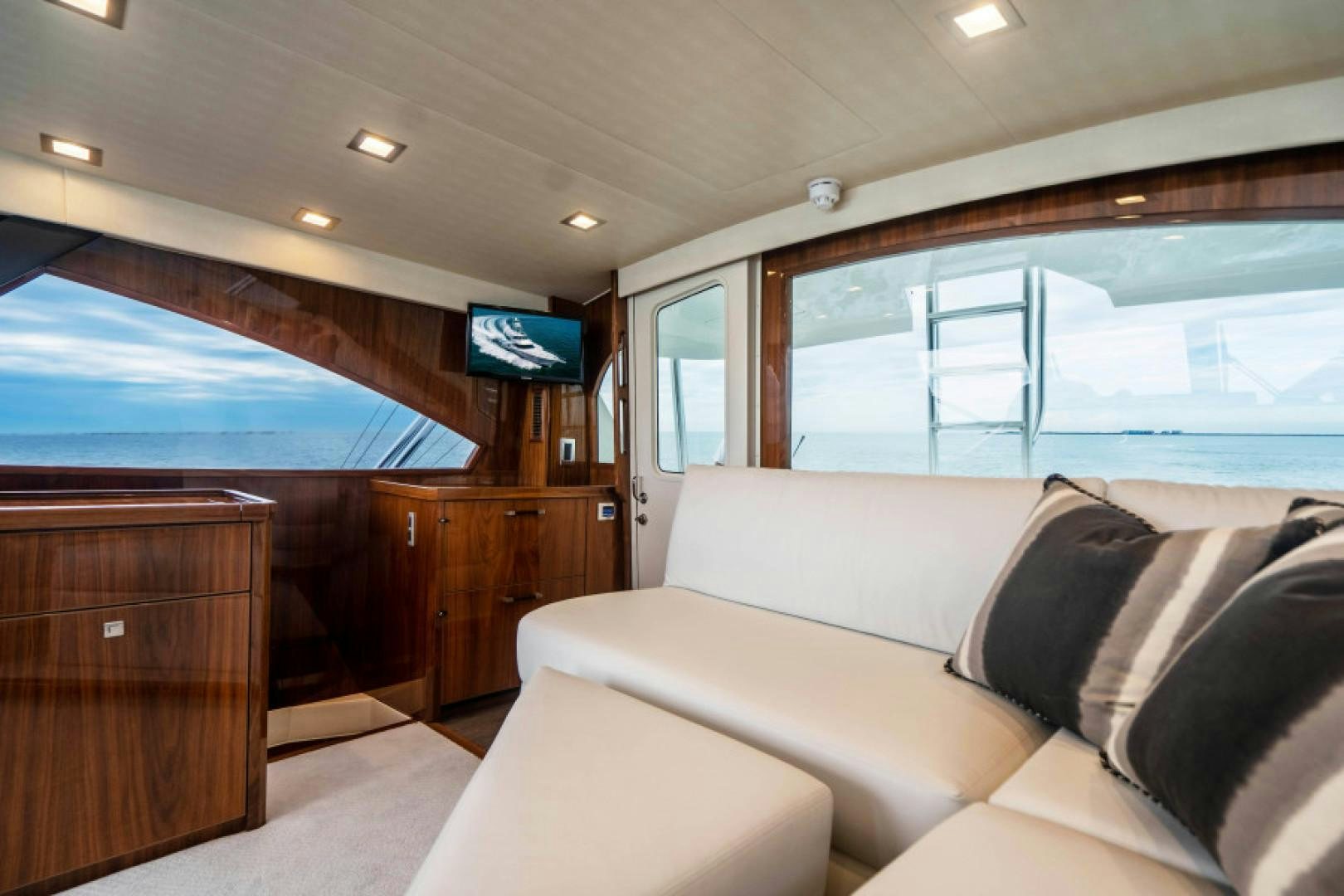 a couch in a room aboard TIKI BAR Yacht for Sale