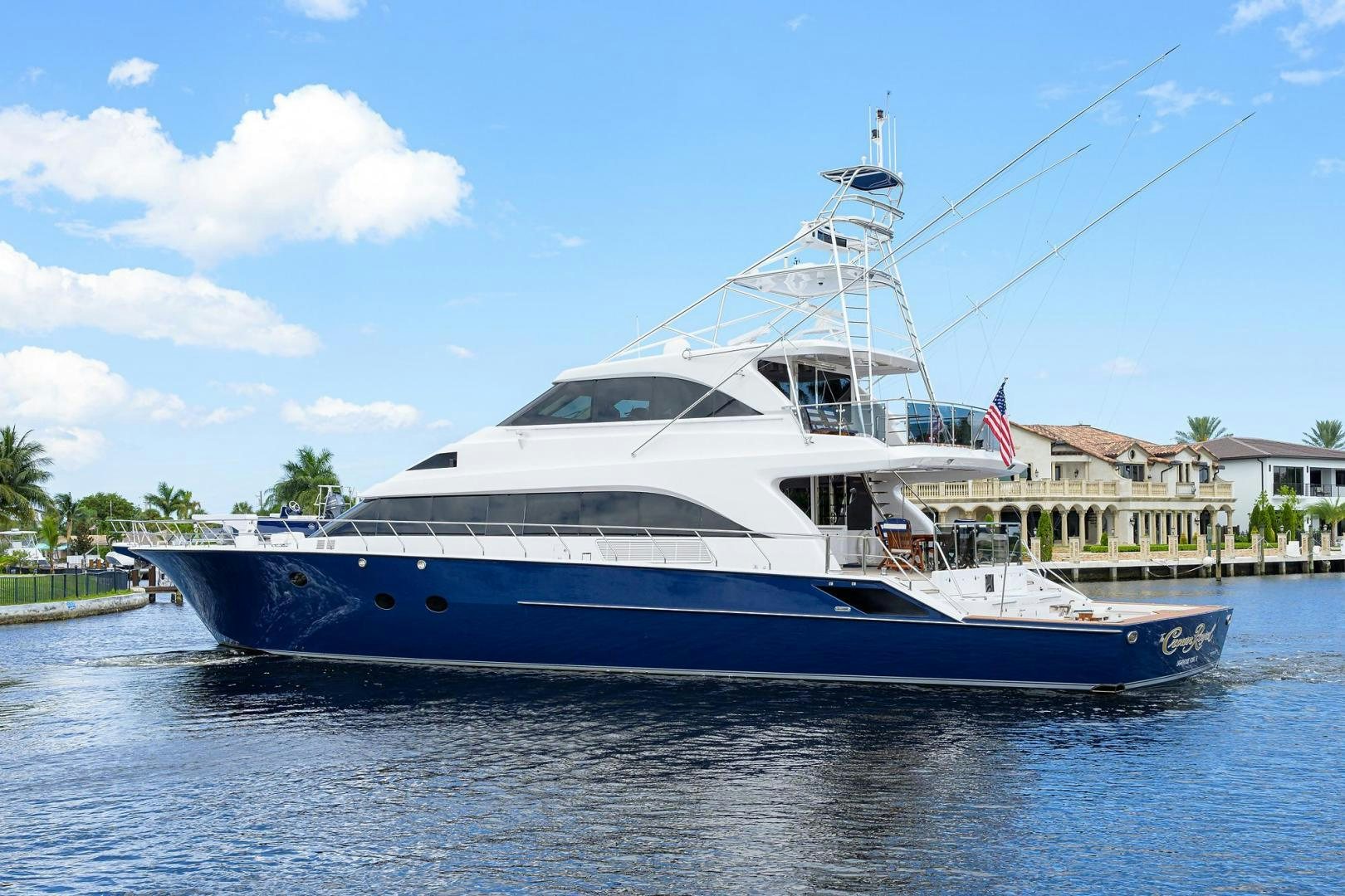 a boat docked at a pier aboard THE CROWN ROYAL Yacht for Sale