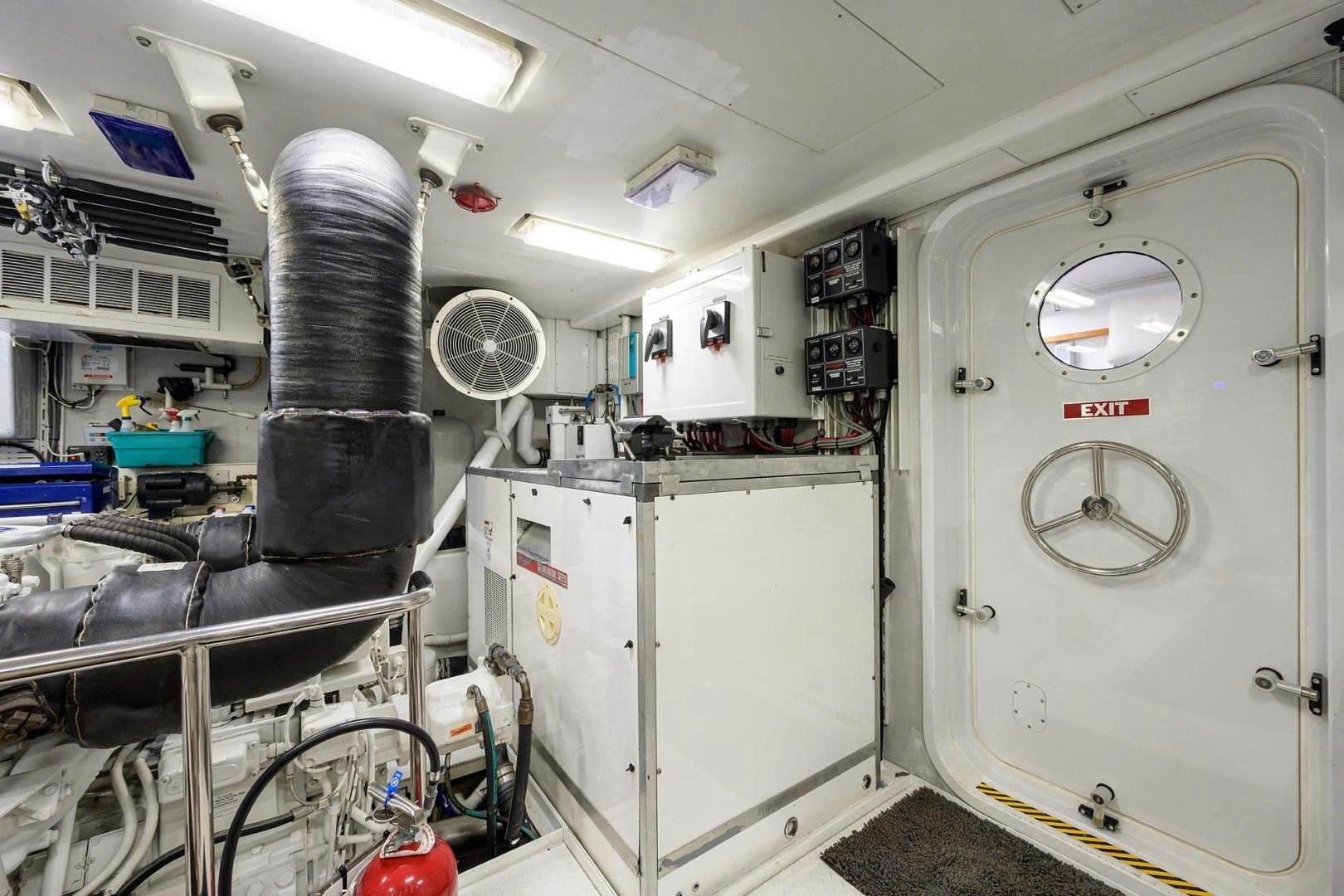 a room with machines and equipment aboard THE CROWN ROYAL Yacht for Sale