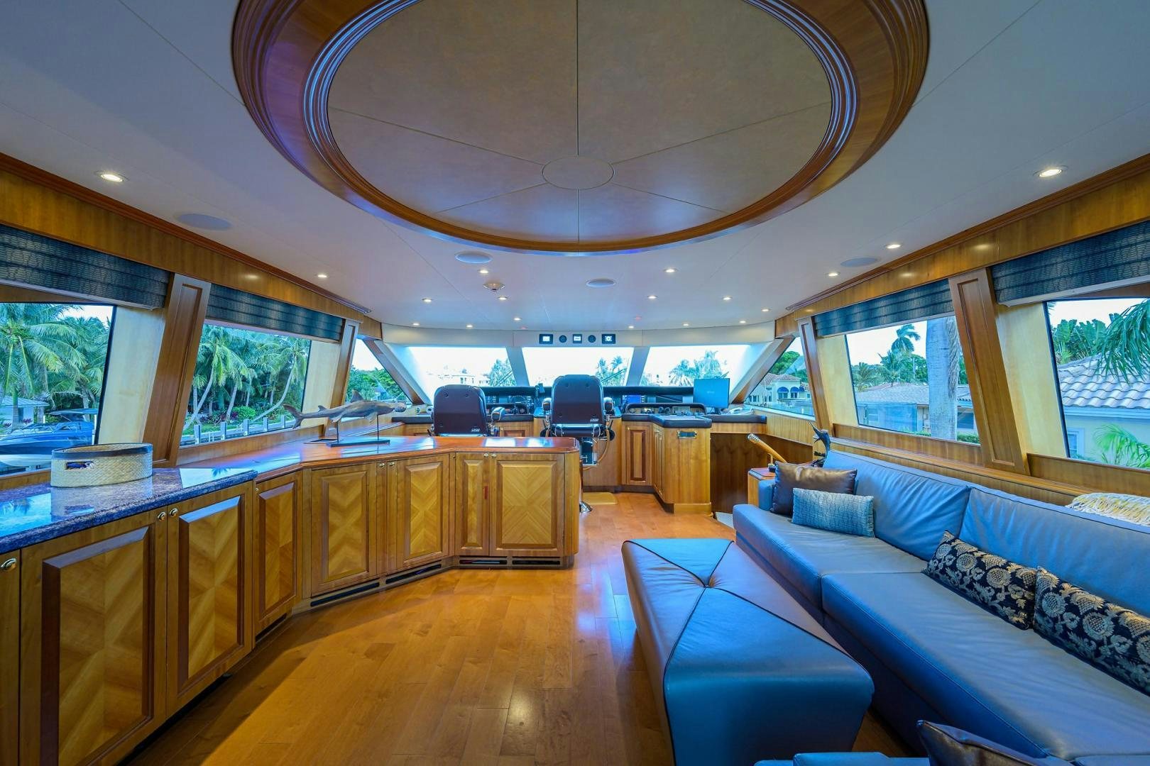 a large room with a couch and a table aboard THE CROWN ROYAL Yacht for Sale