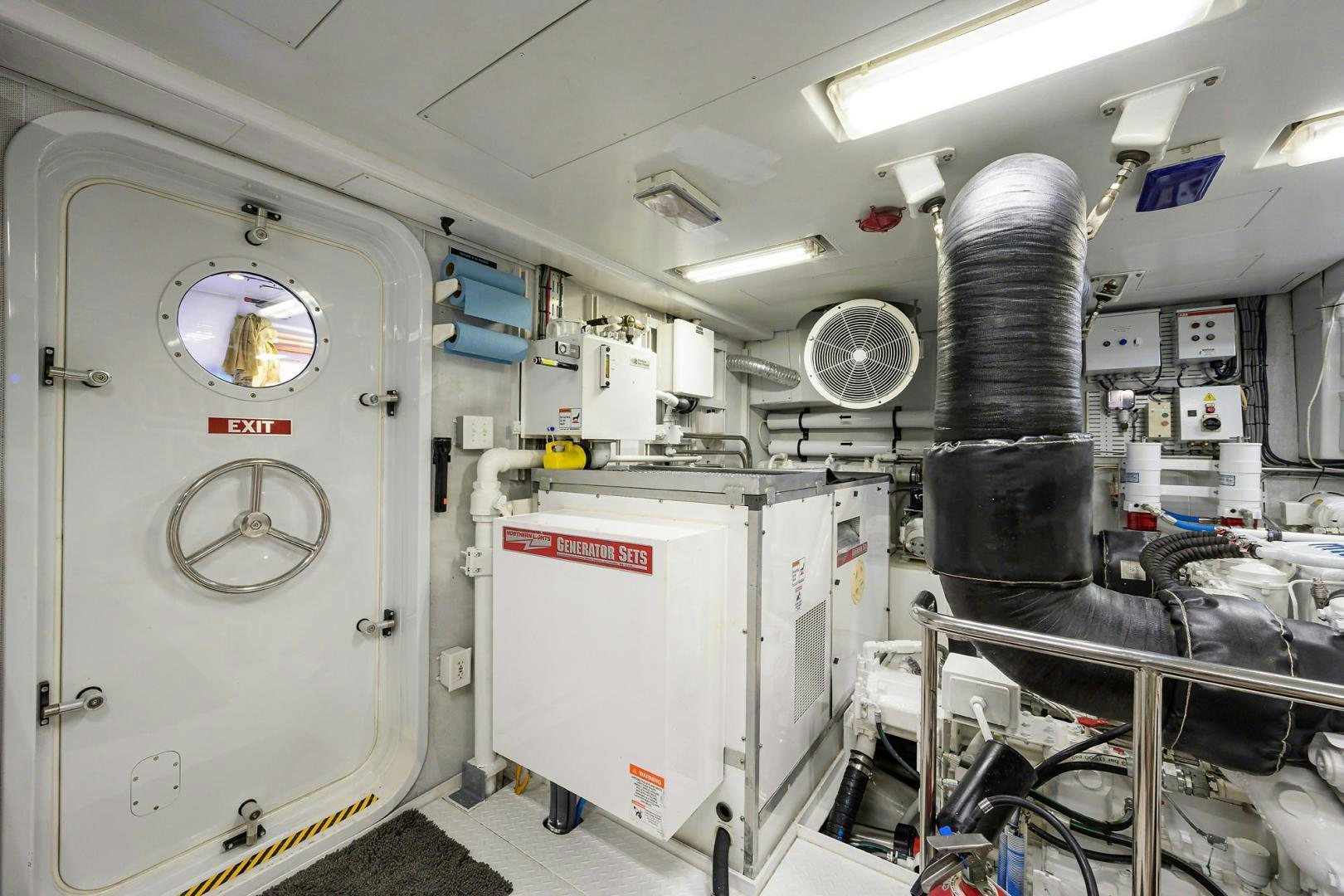 a room with machinery and equipment aboard THE CROWN ROYAL Yacht for Sale