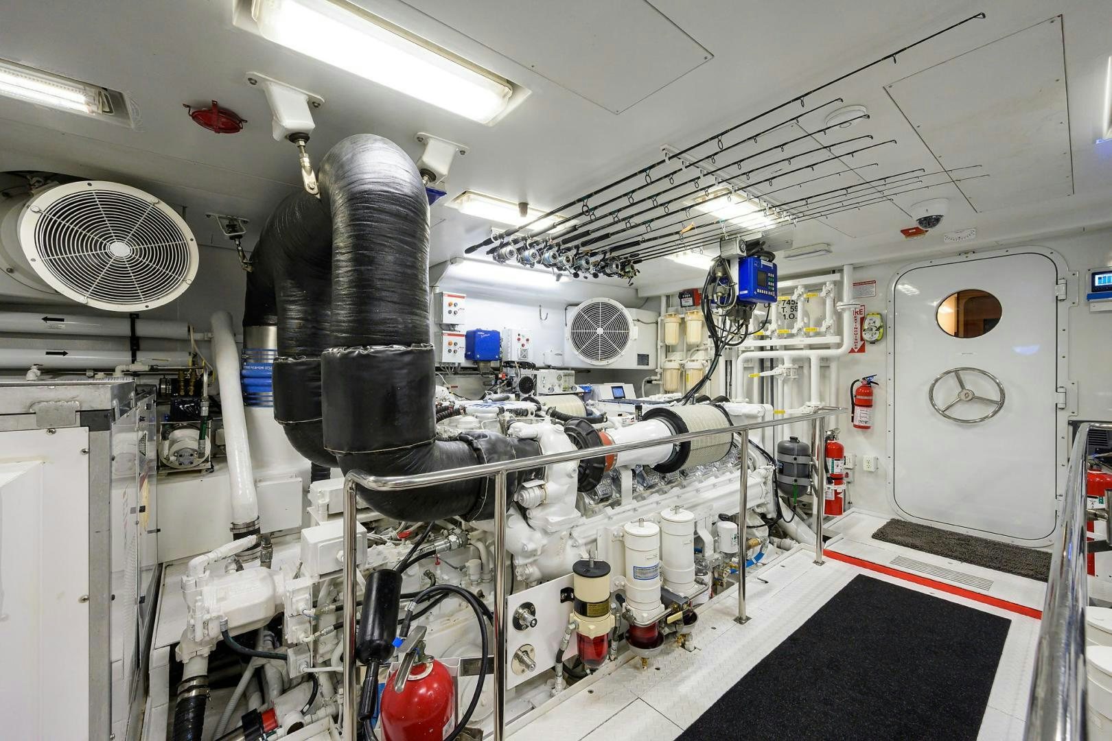a room with machinery and equipment aboard THE CROWN ROYAL Yacht for Sale