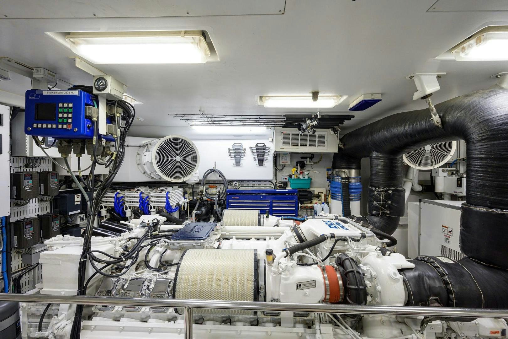 a room with machinery and pipes aboard THE CROWN ROYAL Yacht for Sale