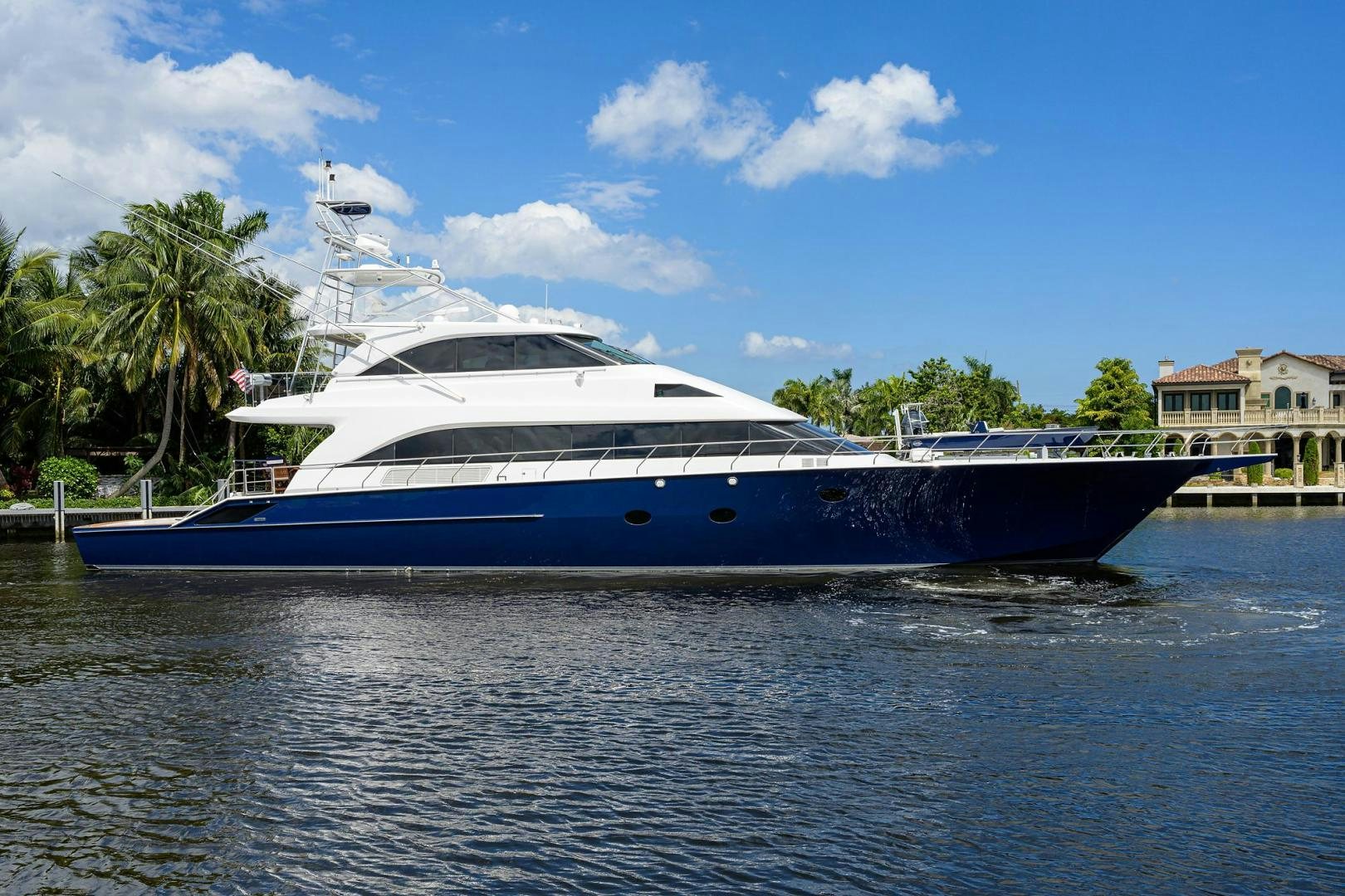 a large blue and white boat aboard THE CROWN ROYAL Yacht for Sale