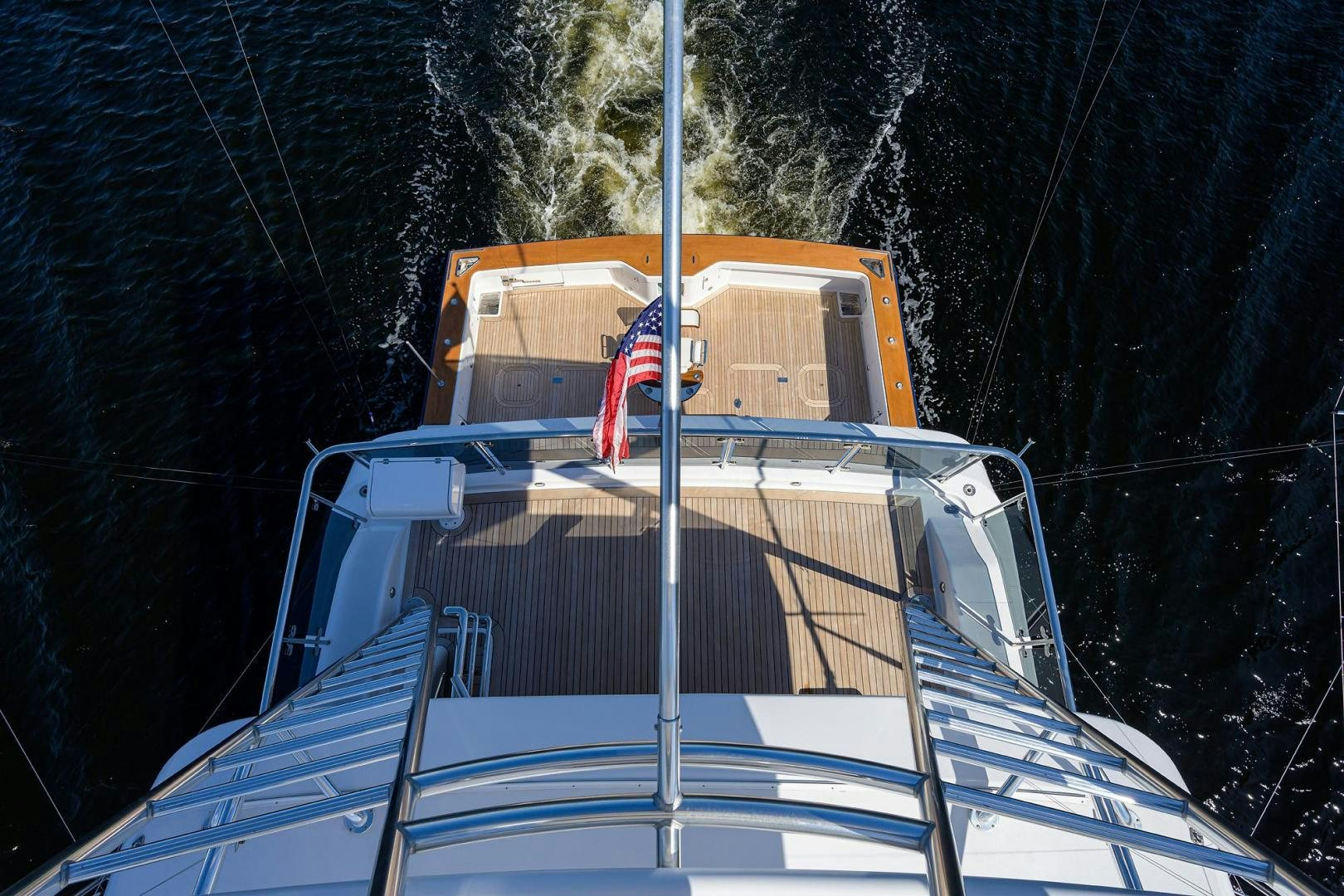 a flag on a boat aboard THE CROWN ROYAL Yacht for Sale