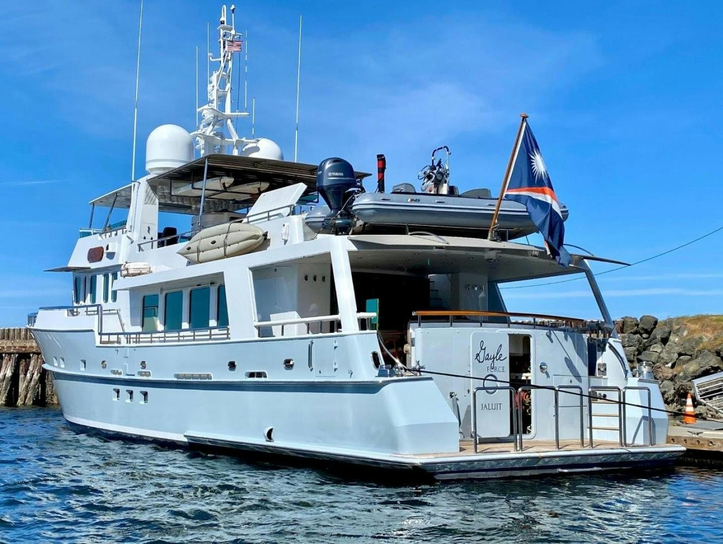 a large white boat with a flag on it aboard COASTAL DRIFTER Yacht for Sale