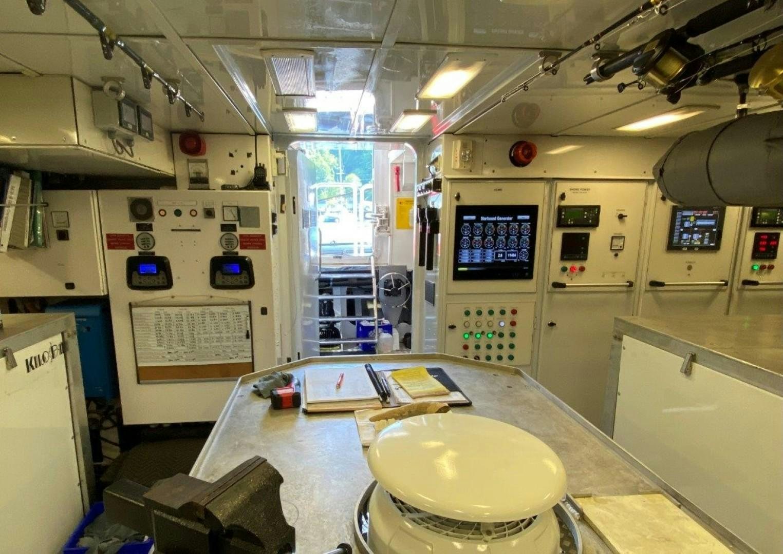 a large kitchen with a large island aboard COASTAL DRIFTER Yacht for Sale