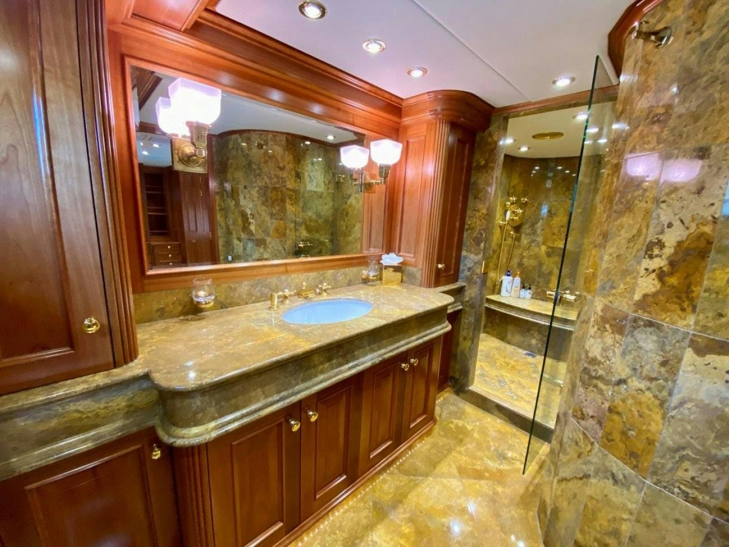 a bathroom with a marble counter aboard COASTAL DRIFTER Yacht for Sale