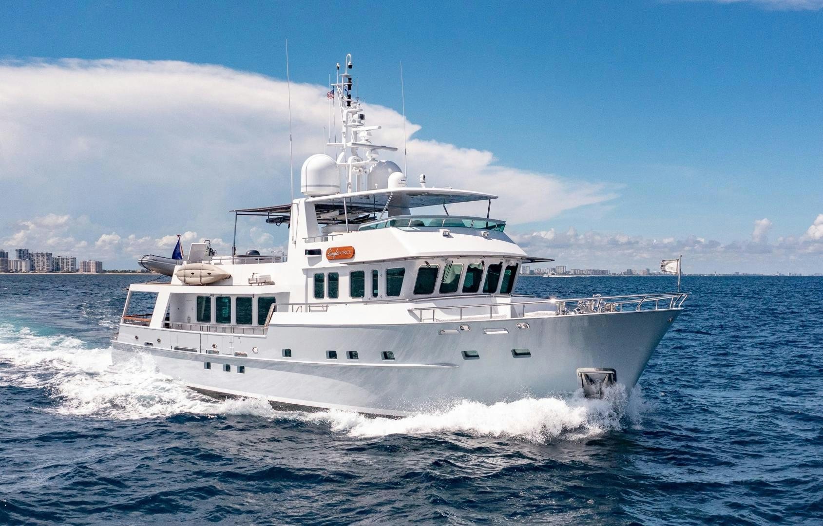 a white boat on the water aboard COASTAL DRIFTER Yacht for Sale