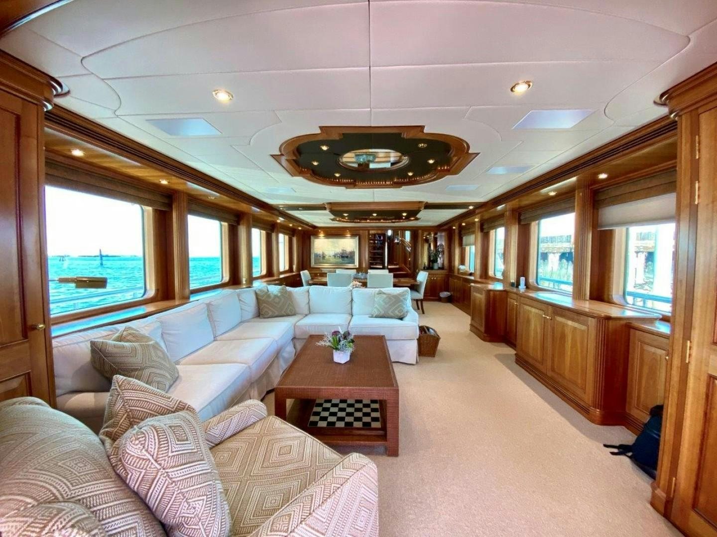 a living room with a large window aboard COASTAL DRIFTER Yacht for Sale