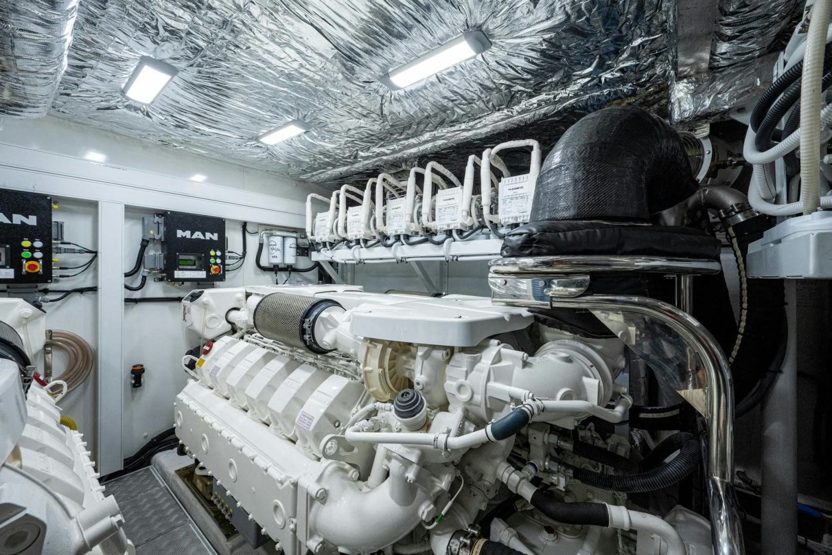 a car with a hood and engine aboard I Love It Yacht for Sale