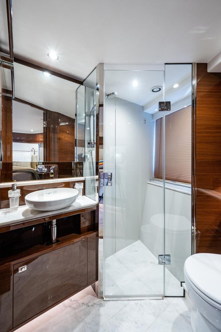 a bathroom with a sink and a shower aboard I Love It Yacht for Sale