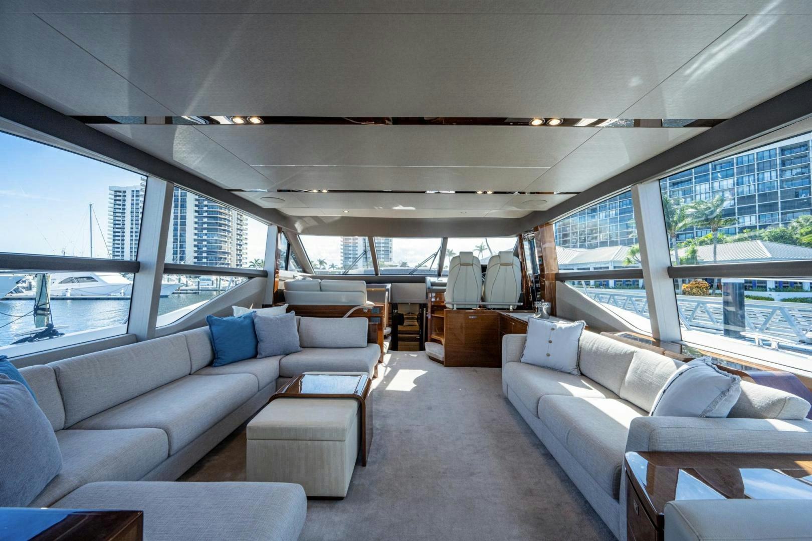 a living room with a large window aboard I Love It Yacht for Sale