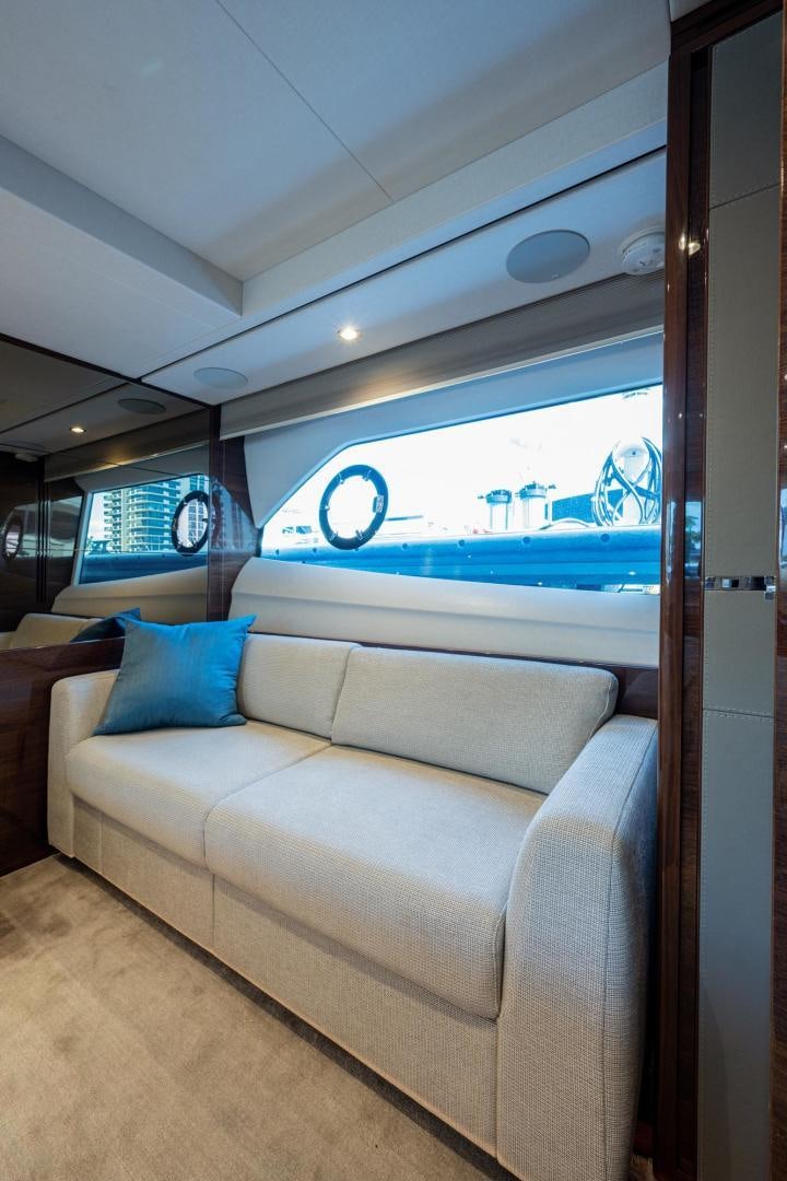 a couch in a room aboard I Love It Yacht for Sale