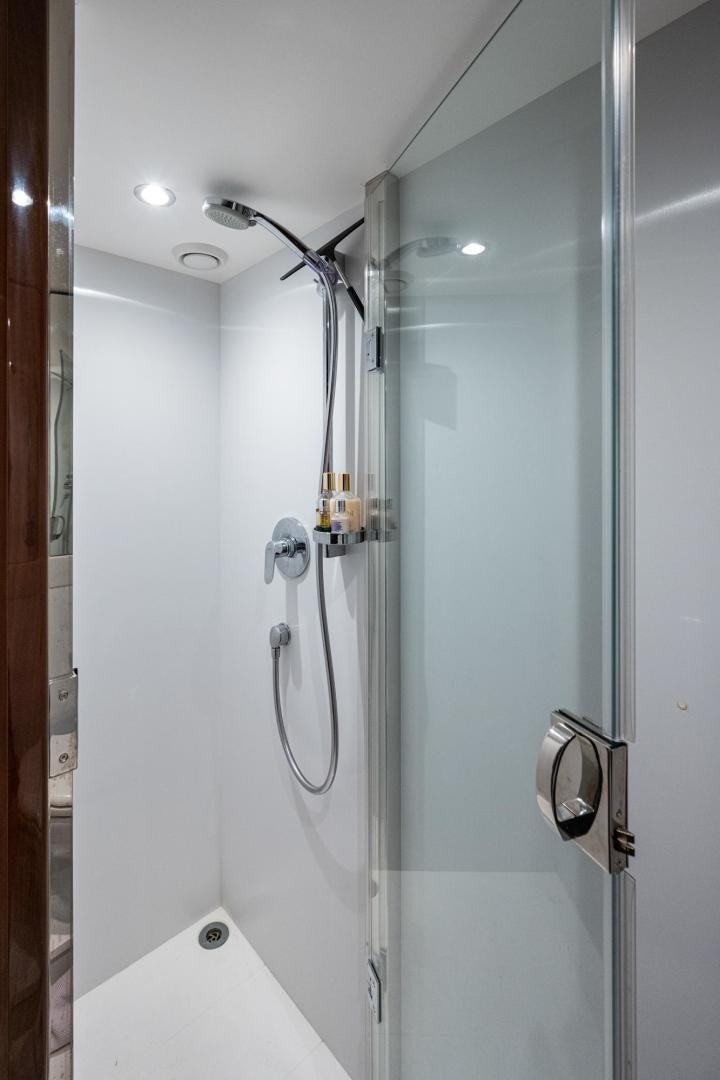 a shower with a glass door aboard I Love It Yacht for Sale