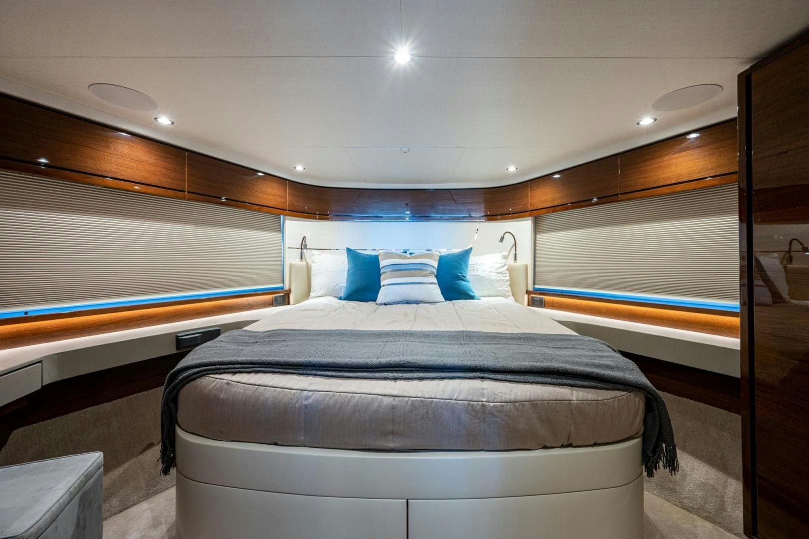 a bed in a room aboard I Love It Yacht for Sale
