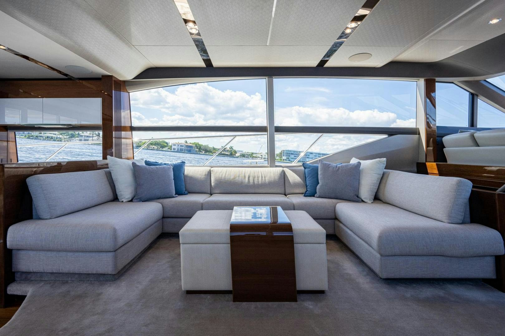 a living room with a large window aboard I Love It Yacht for Sale