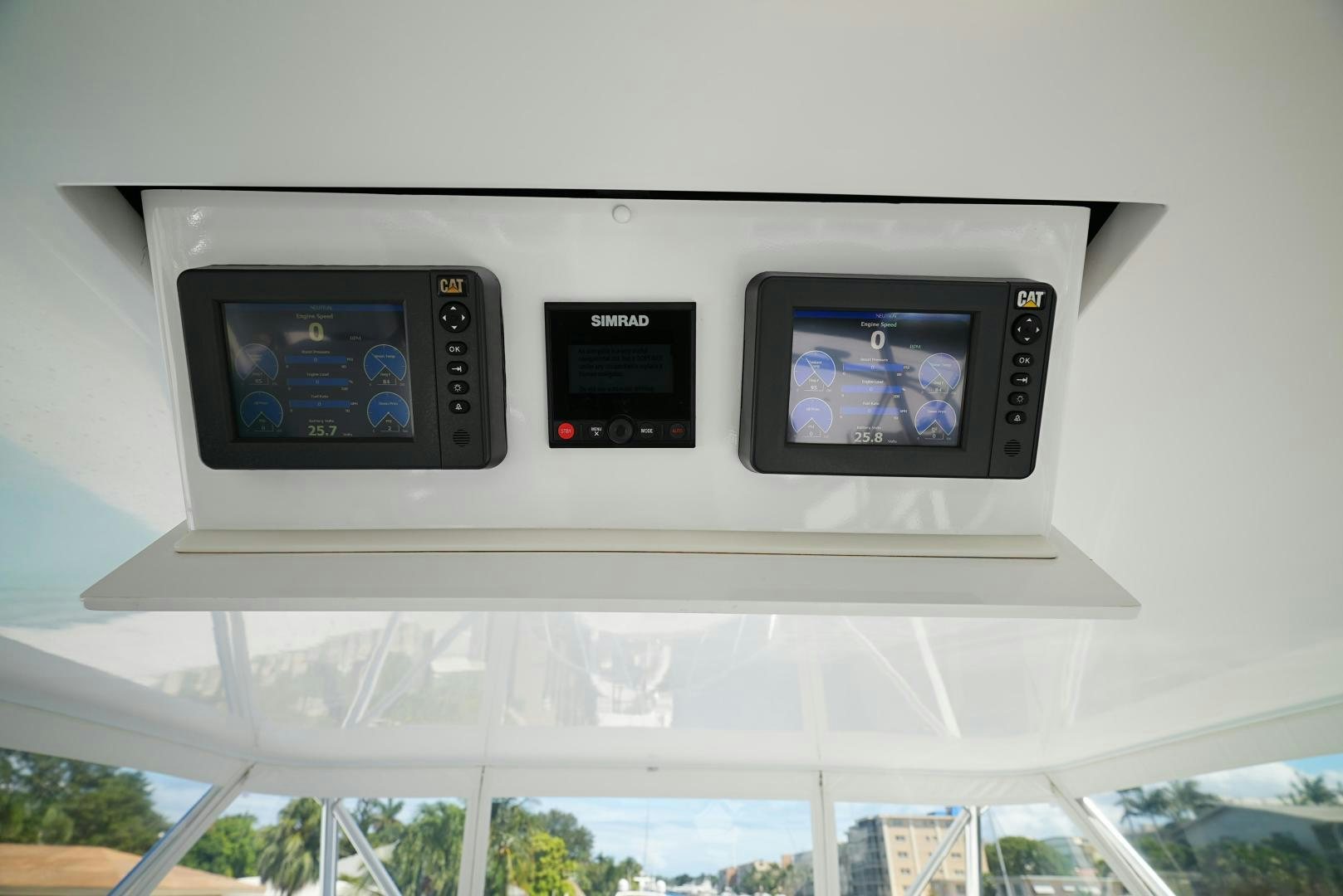 a white rectangular electronic device aboard LYON FISH Yacht for Sale