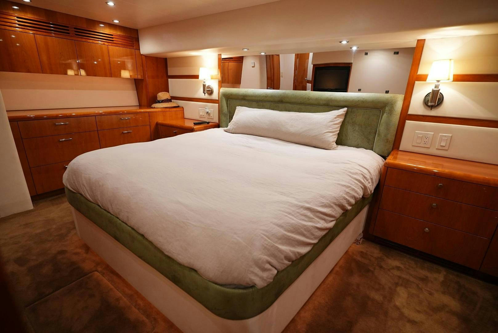 a bed in a room aboard LYON FISH Yacht for Sale