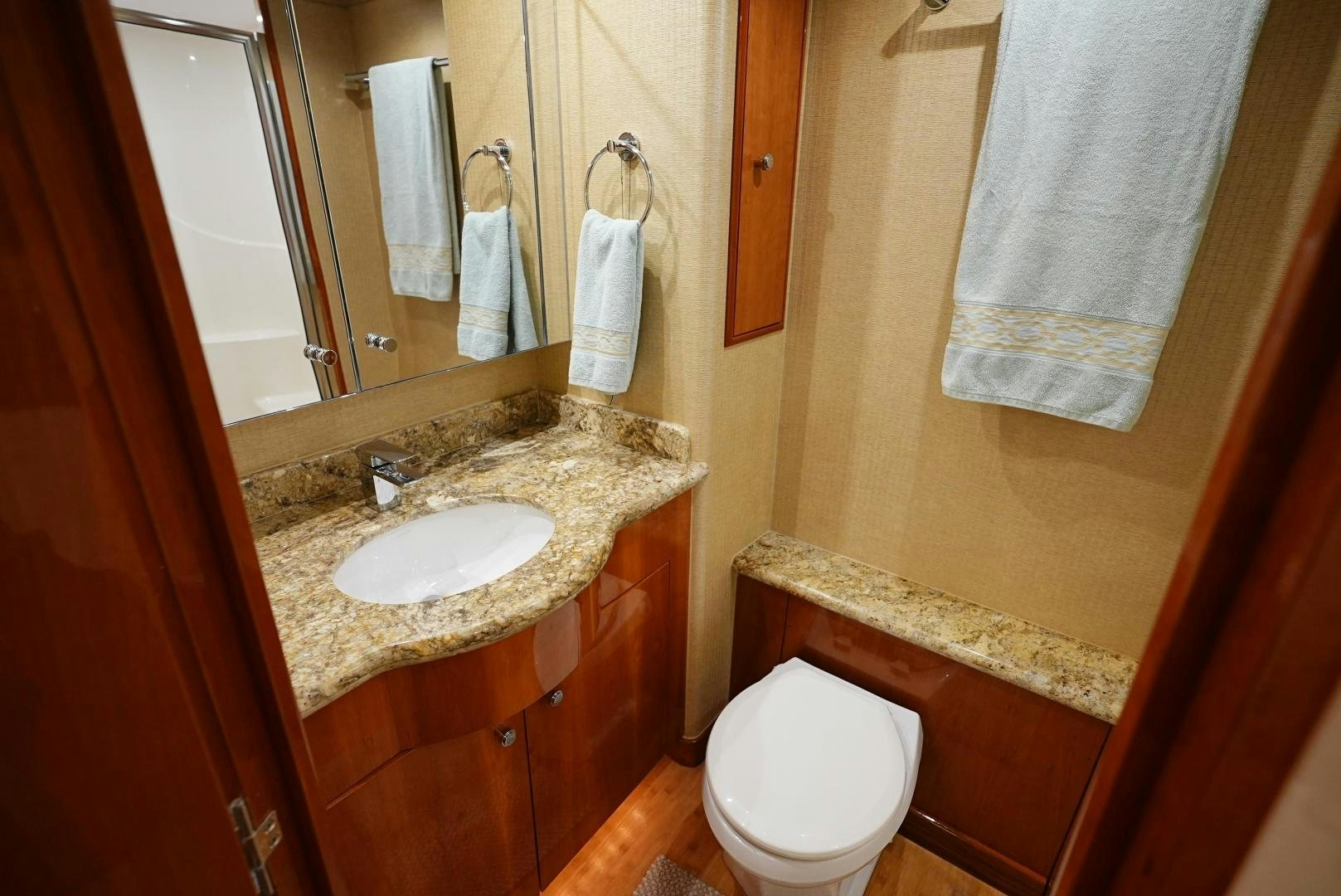 a bathroom with a sink and toilet aboard LYON FISH Yacht for Sale