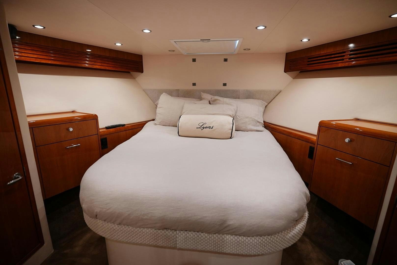 a bed in a room aboard LYON FISH Yacht for Sale