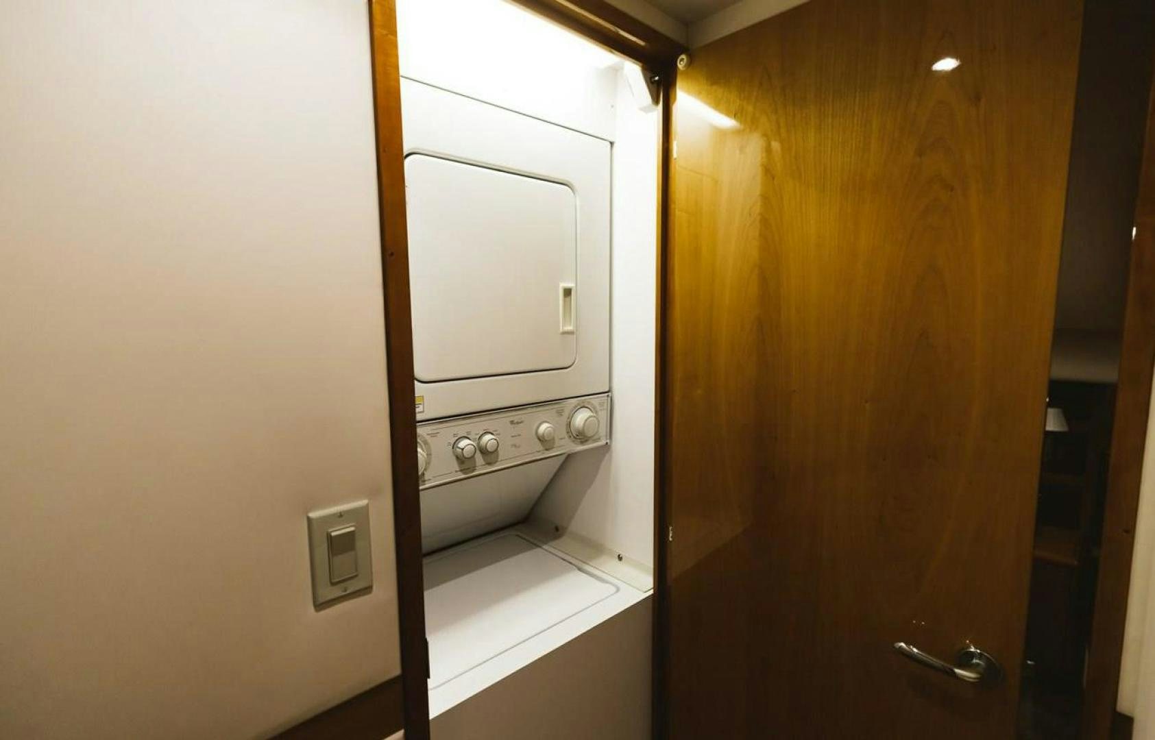 a closet with a door aboard LYON FISH Yacht for Sale