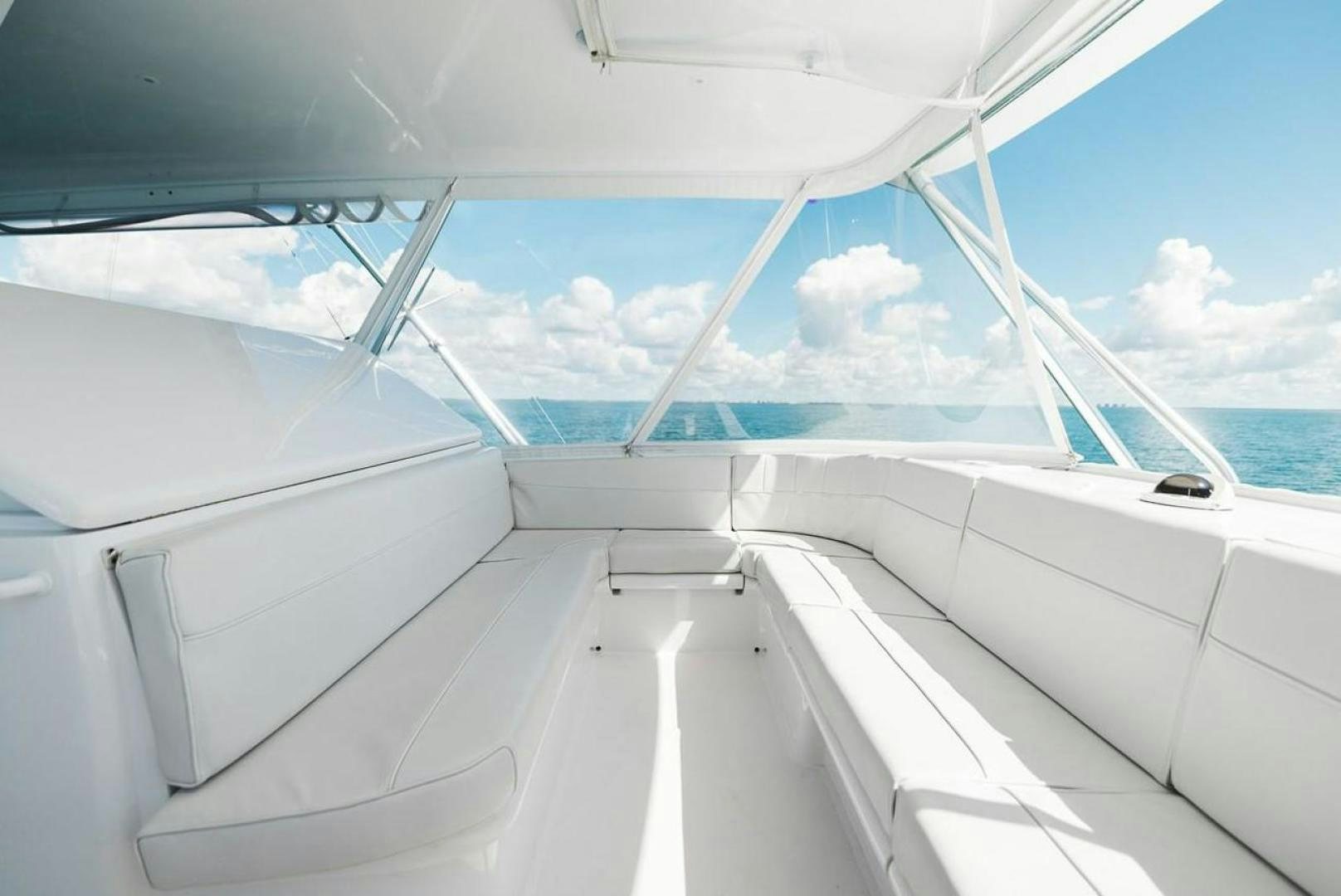 a white boat on the water aboard LYON FISH Yacht for Sale