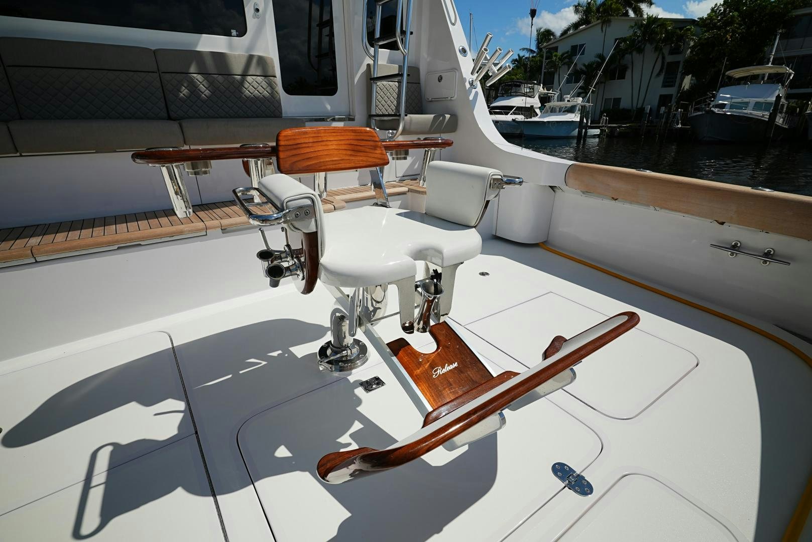 a white boat on a deck aboard LYON FISH Yacht for Sale