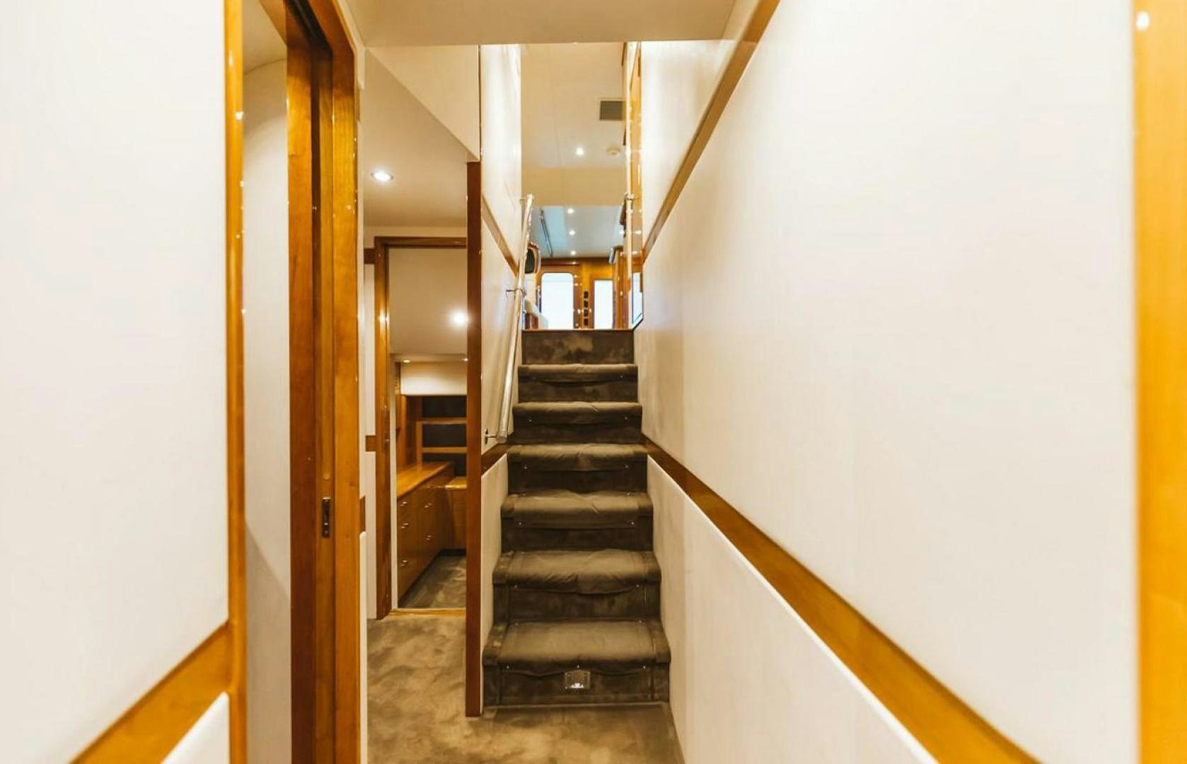 a staircase with a railing aboard LYON FISH Yacht for Sale