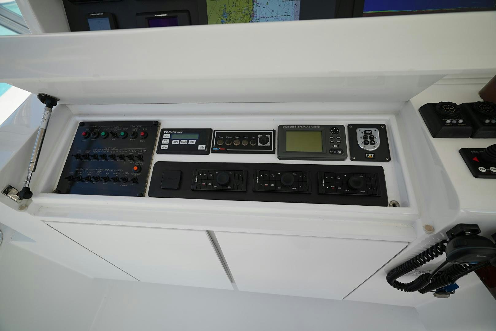a white printer with buttons and a black and white screen aboard LYON FISH Yacht for Sale