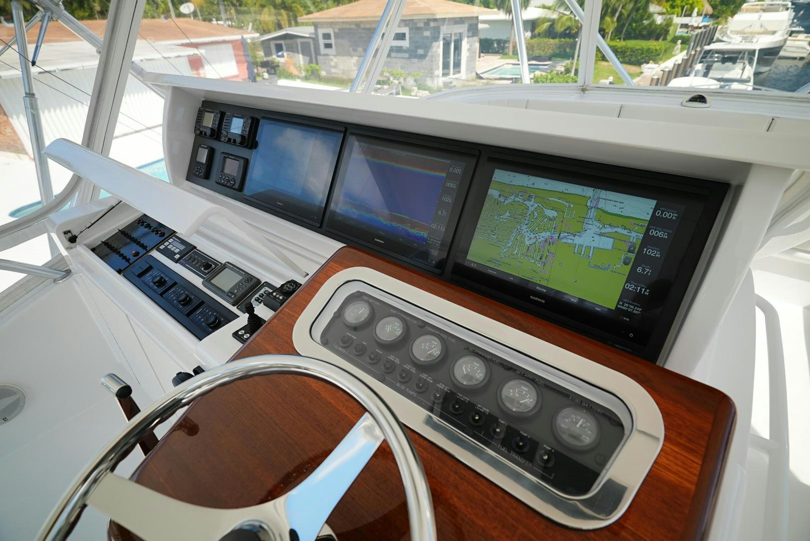 a group of monitors on a table aboard LYON FISH Yacht for Sale
