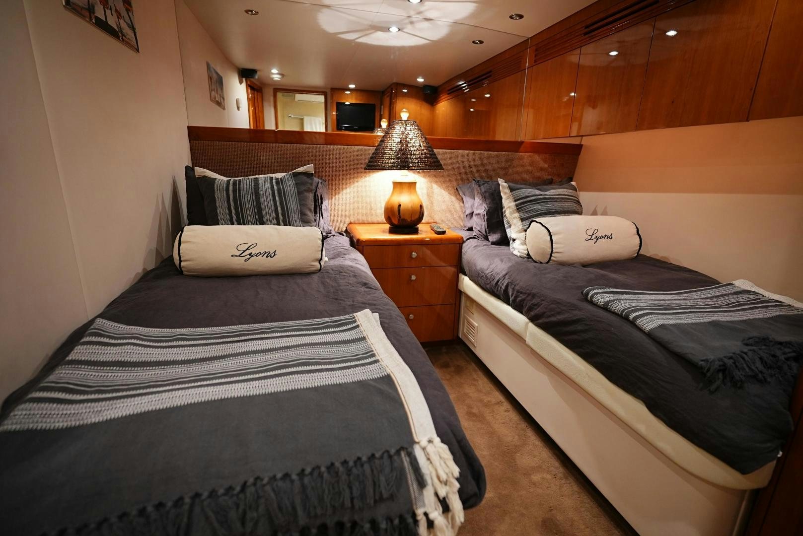 a couple of beds in a room aboard LYON FISH Yacht for Sale