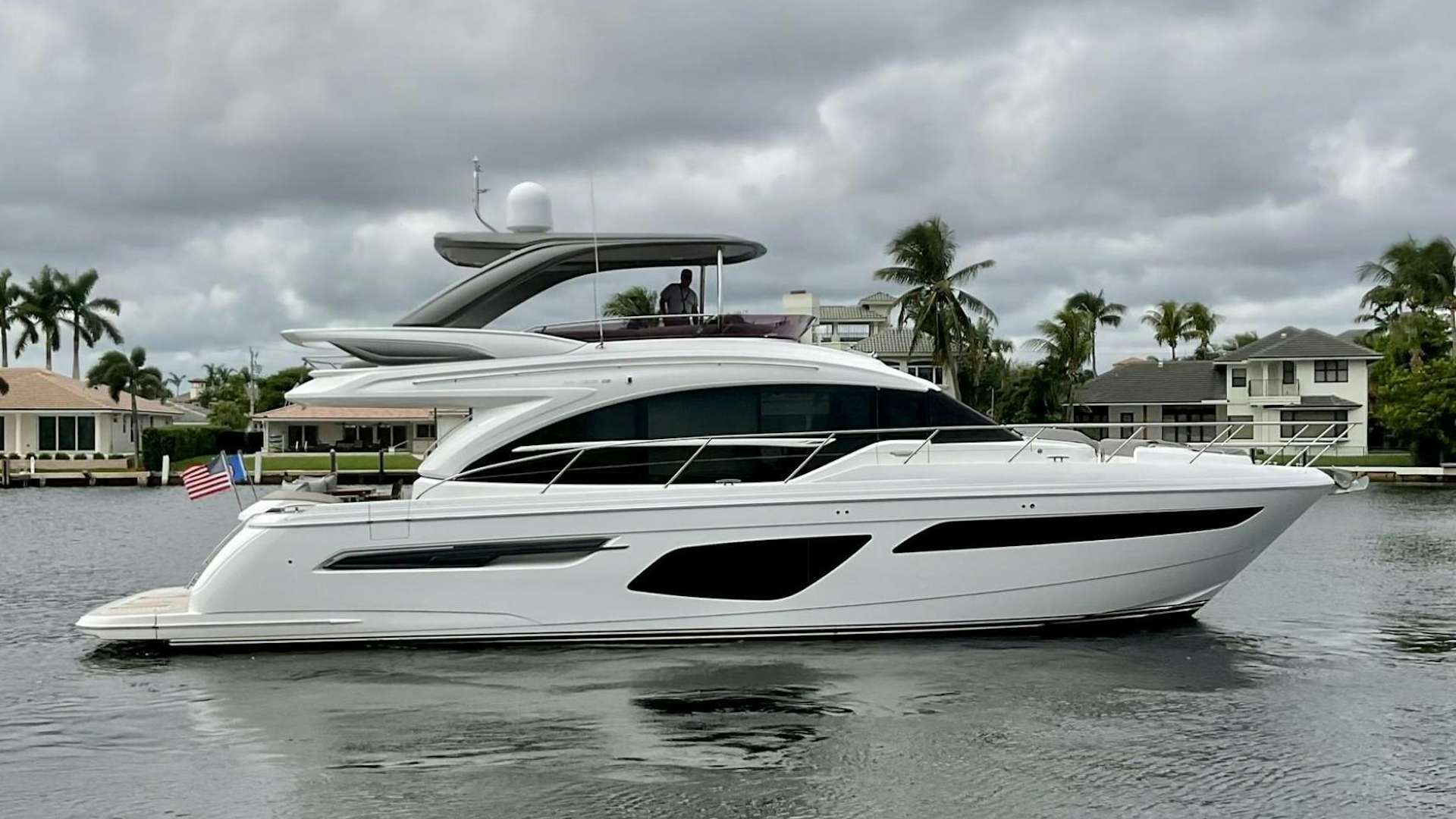 a white yacht in the water aboard CHAPTER TWO Yacht for Sale