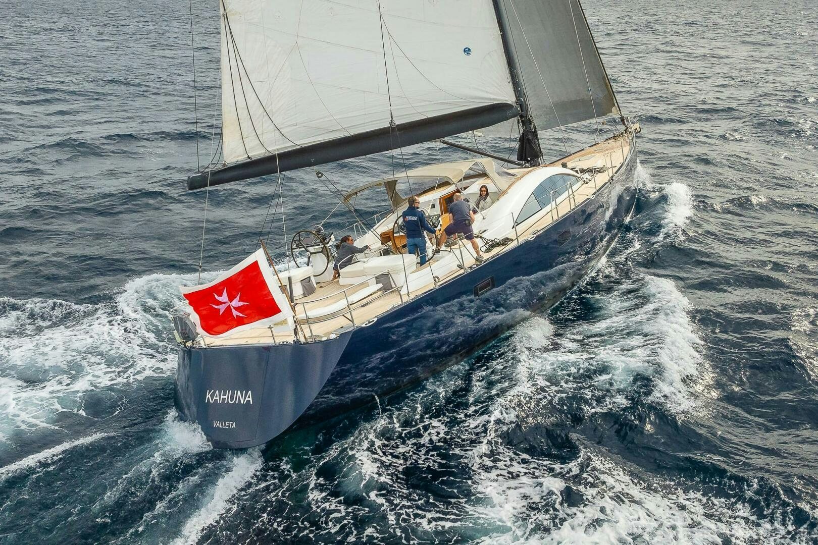 a boat with people on it aboard KAHUNA Yacht for Sale