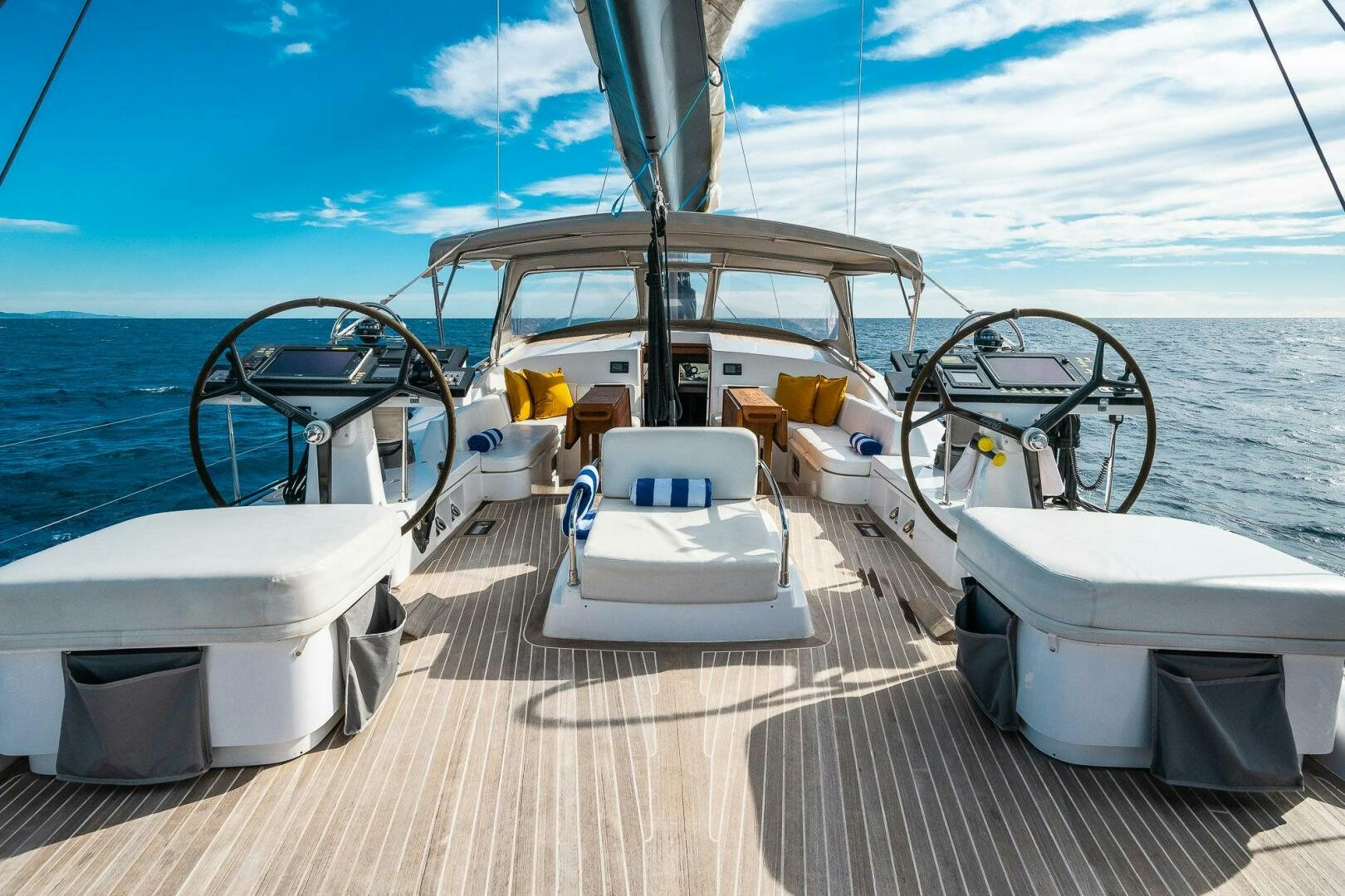 a boat with a large white tub and a bicycle on the front aboard KAHUNA Yacht for Sale