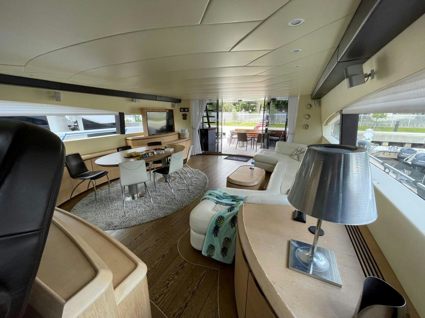 a room with a desk and chairs aboard SILVER MAMA Yacht for Sale