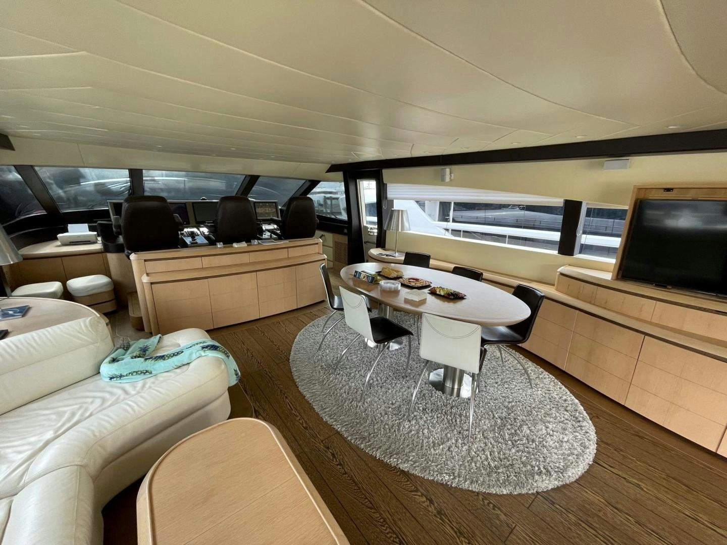 a room with a couch and a tv aboard SILVER MAMA Yacht for Sale