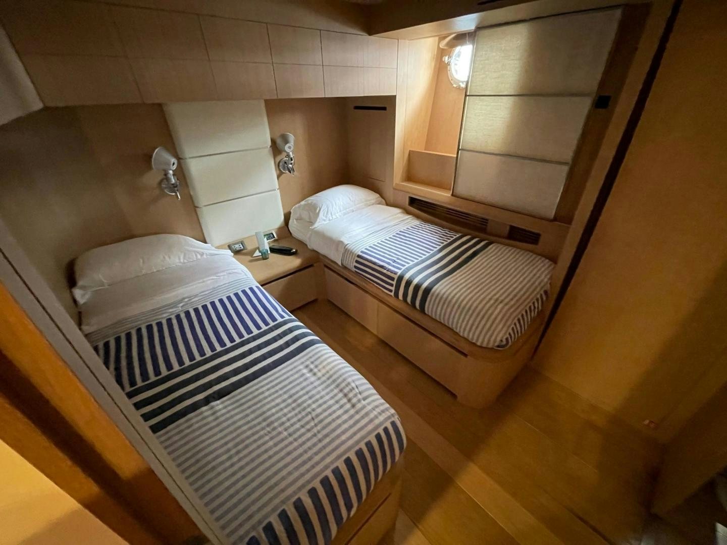 a couple of beds in a room aboard SILVER MAMA Yacht for Sale