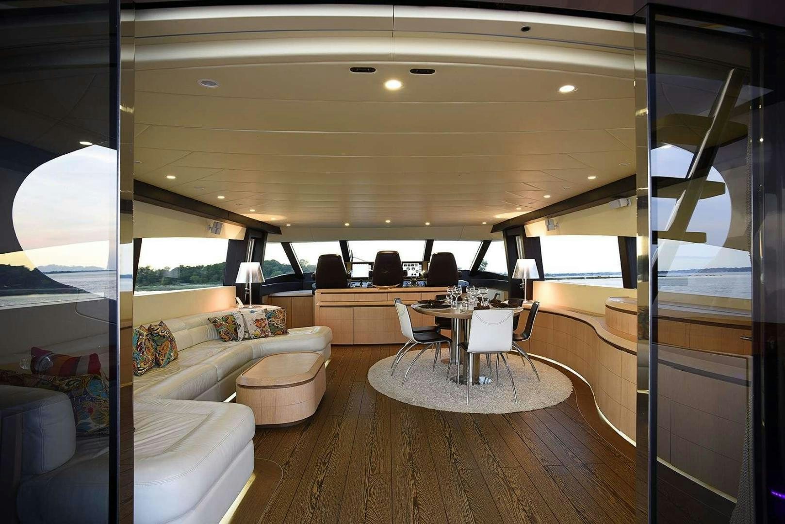 a living room with a wood floor aboard SILVER MAMA Yacht for Sale