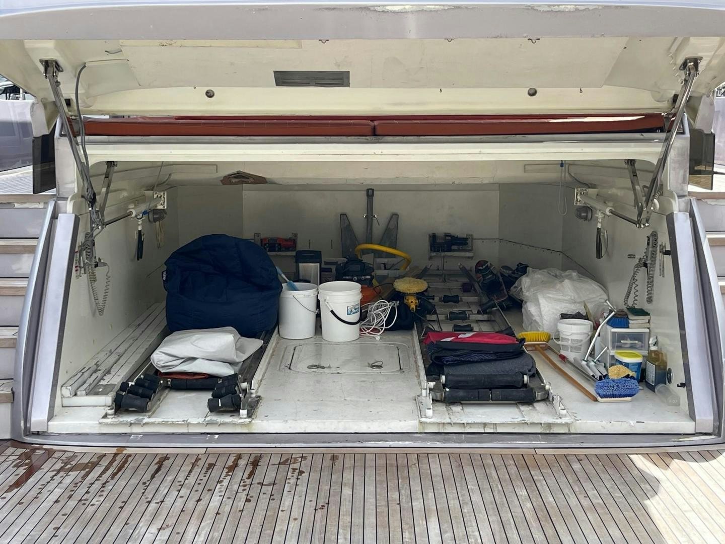 a large white machine with a bucket on the side aboard SILVER MAMA Yacht for Sale