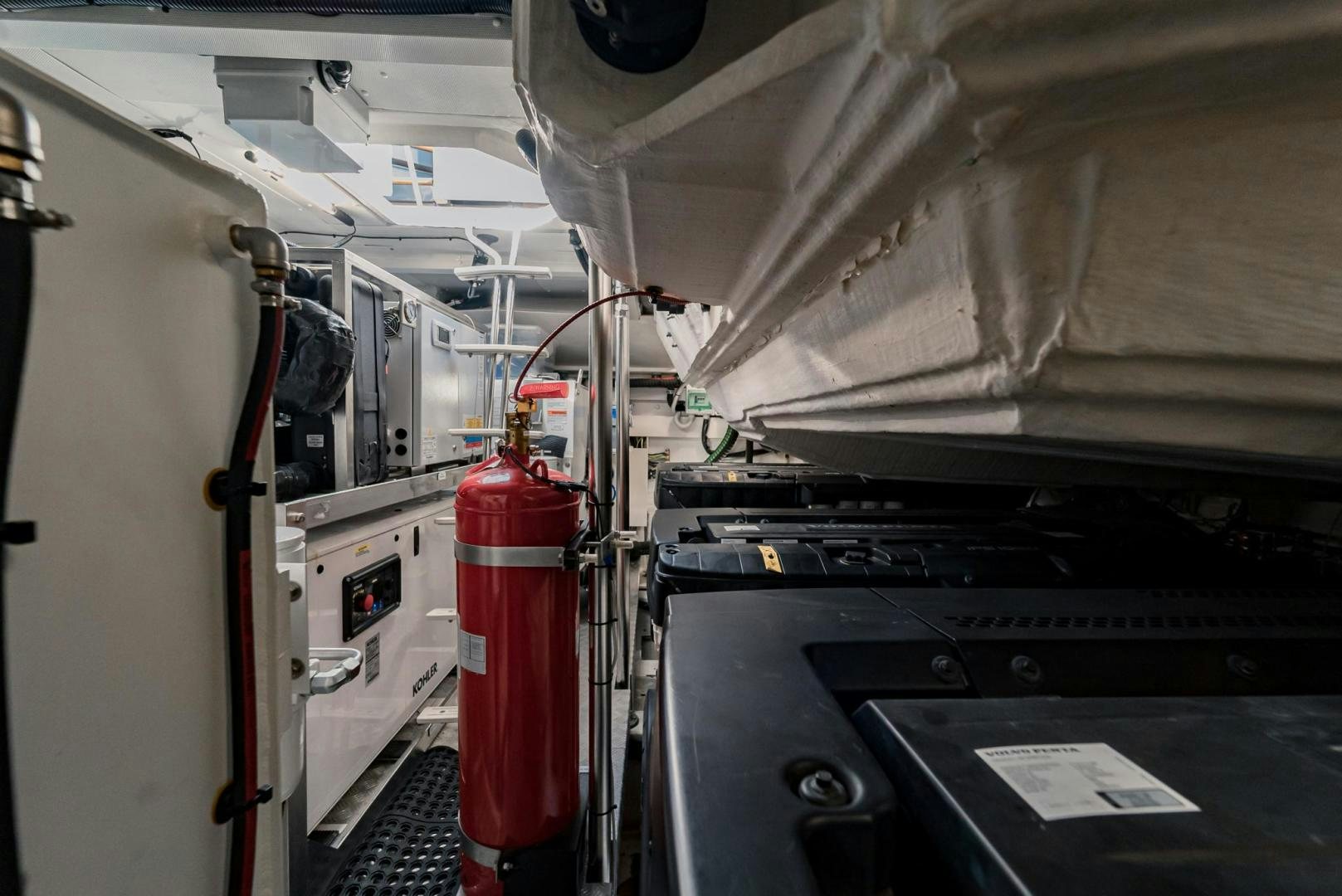 a red and white cylinder in a factory aboard HOME SOUTH Yacht for Sale
