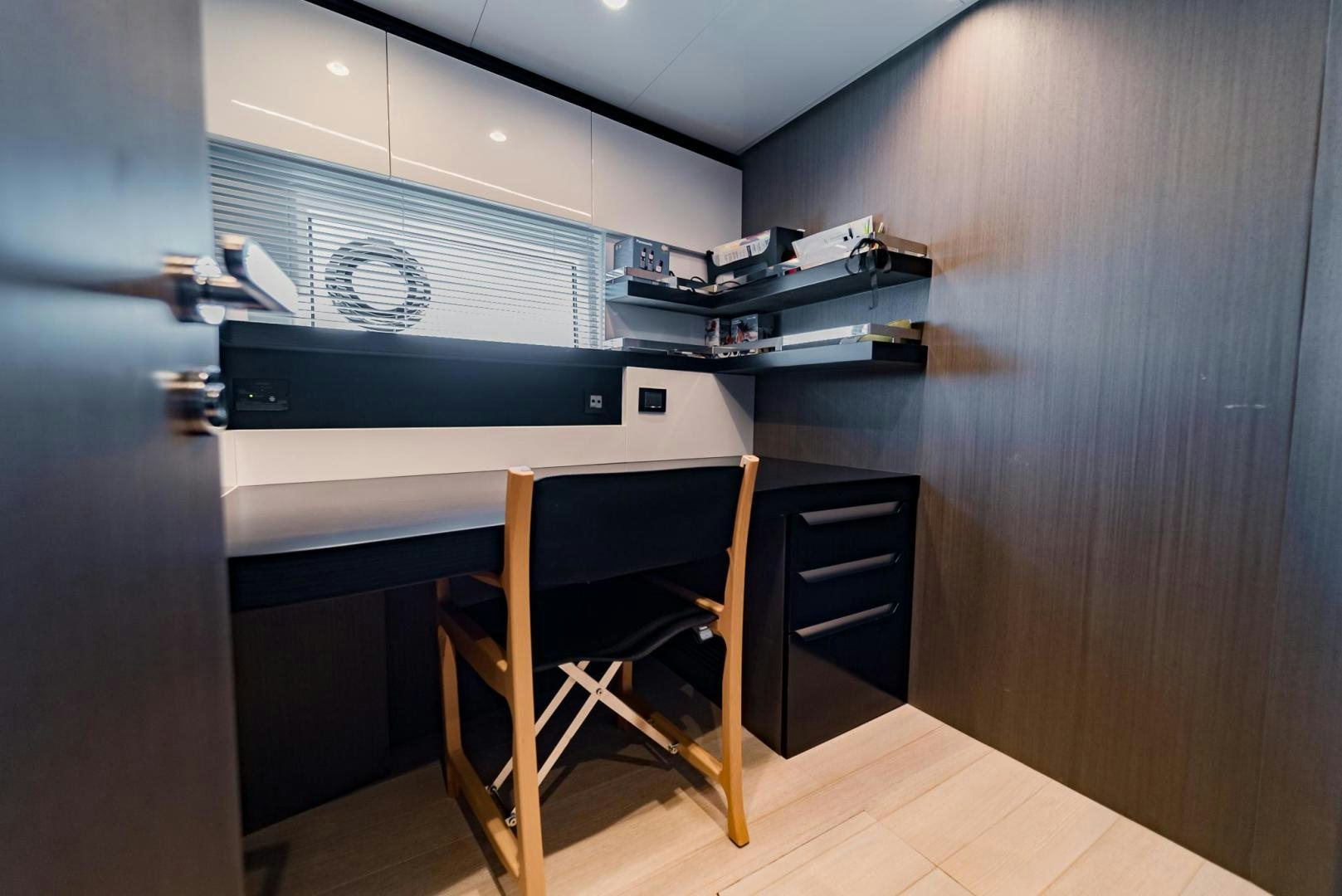 a chair in a room aboard HOME SOUTH Yacht for Sale