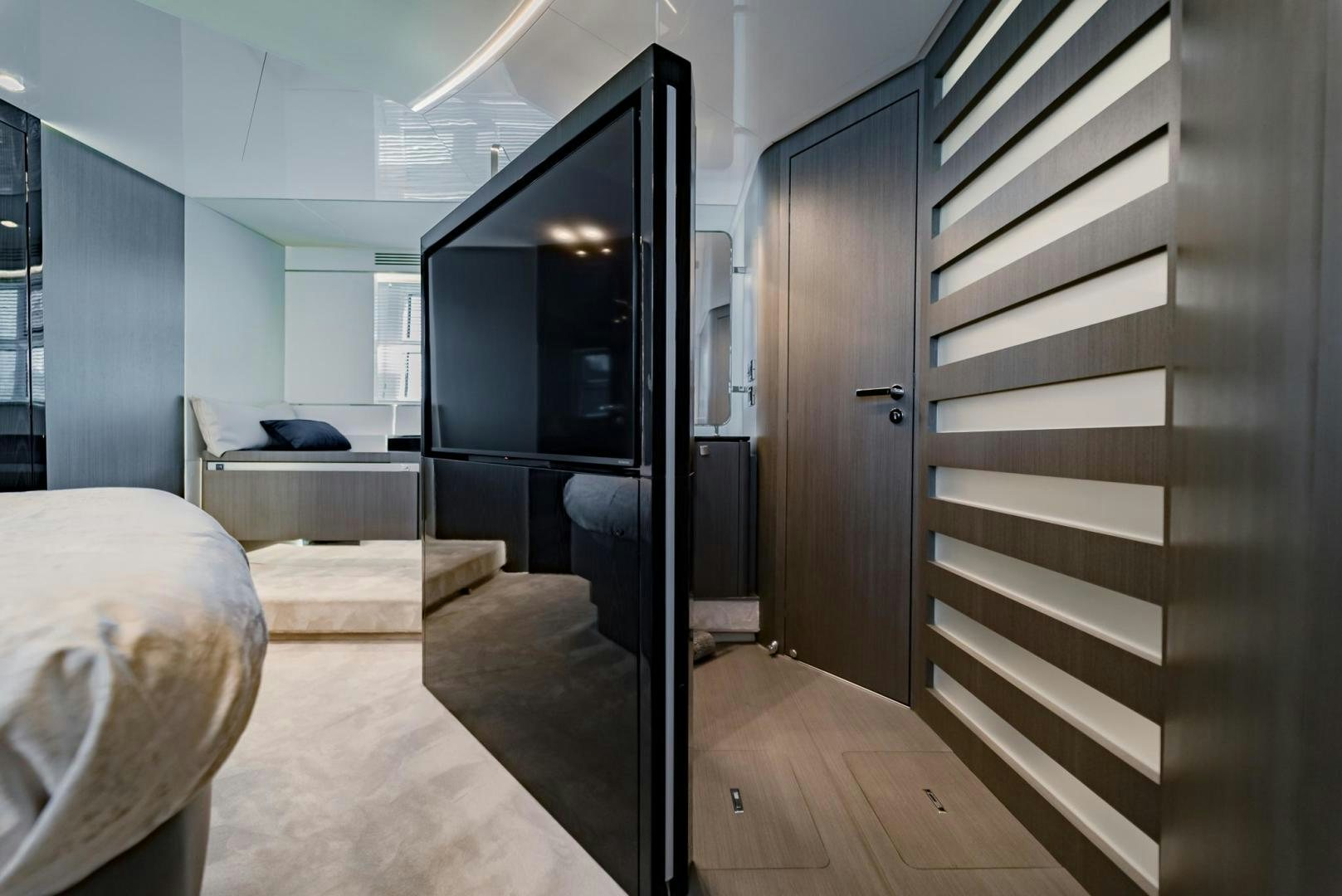 a room with a bed and a tv aboard HOME SOUTH Yacht for Sale