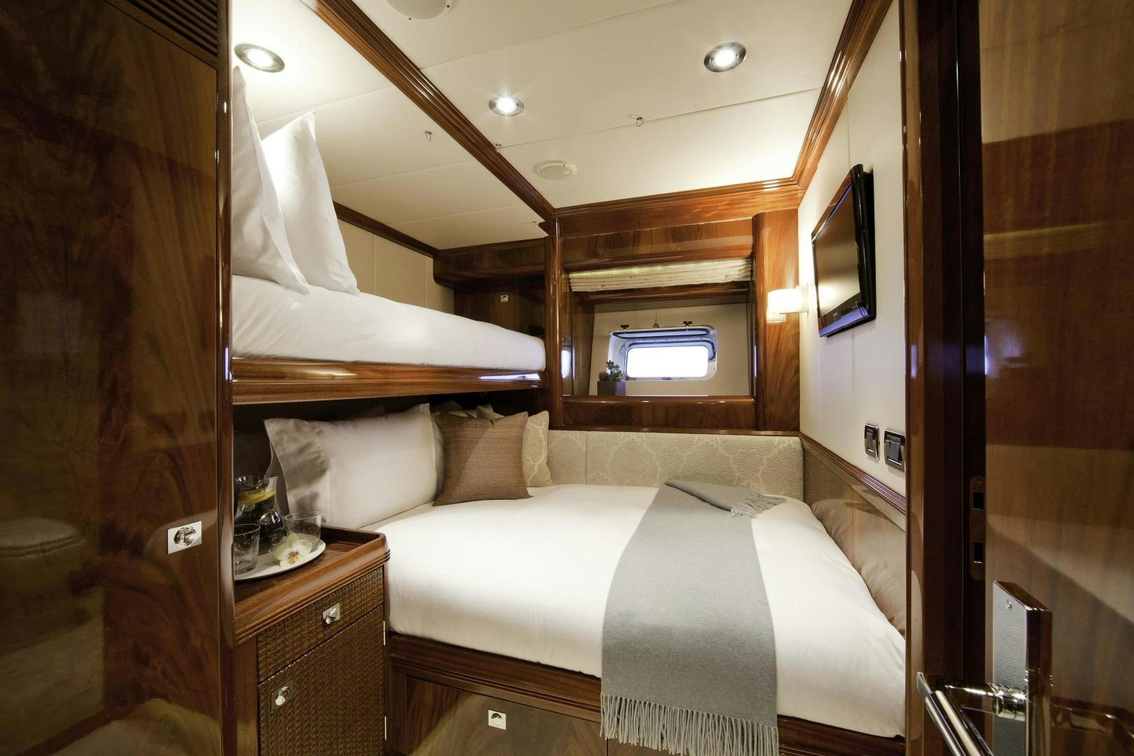 a bed in a room aboard DESTINATION Yacht for Sale