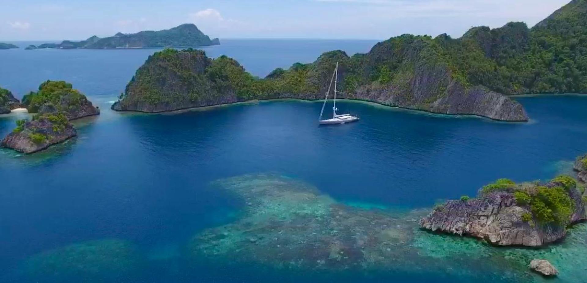 a boat on the water aboard DESTINATION Yacht for Sale