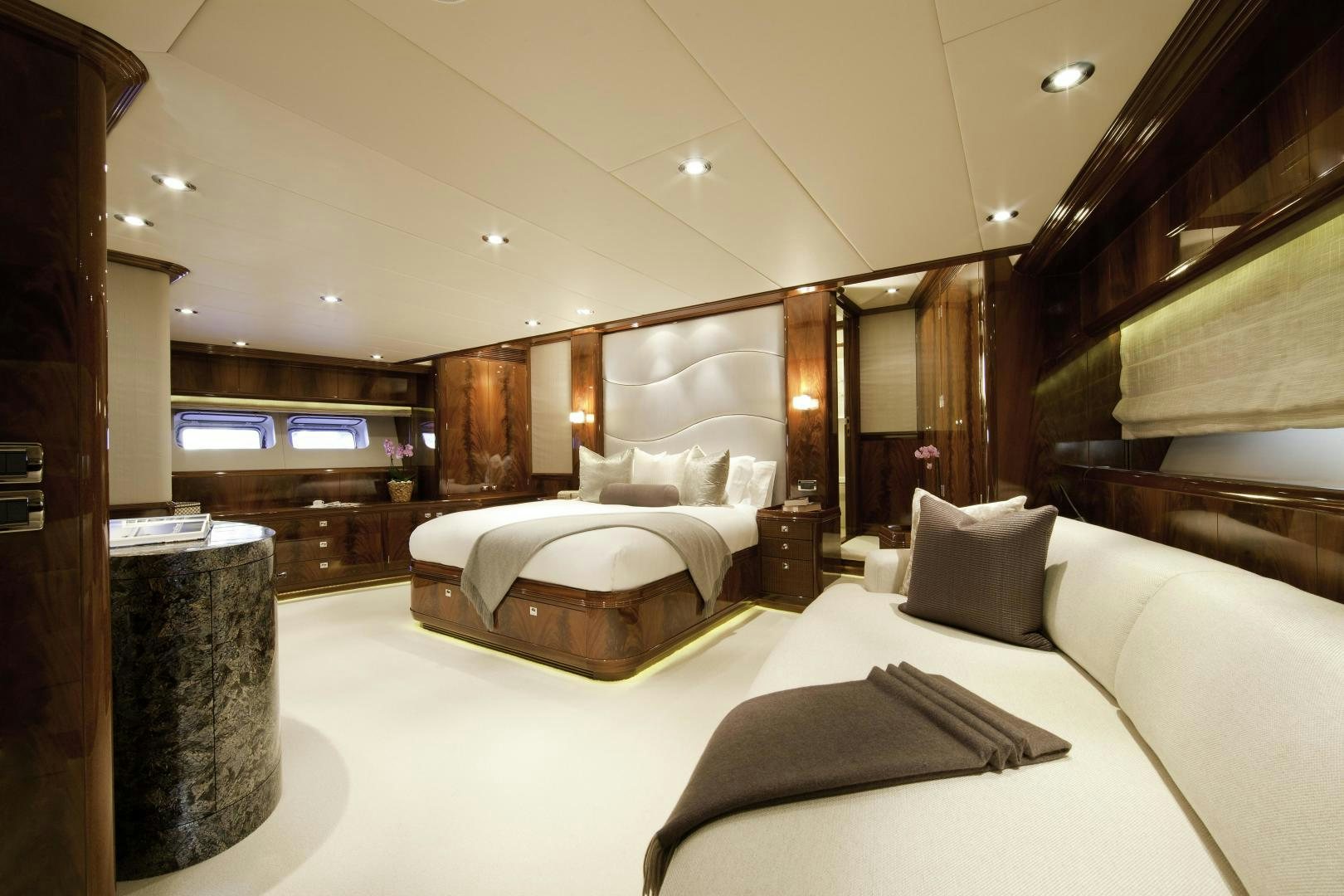 a hotel room with a bed aboard DESTINATION Yacht for Sale